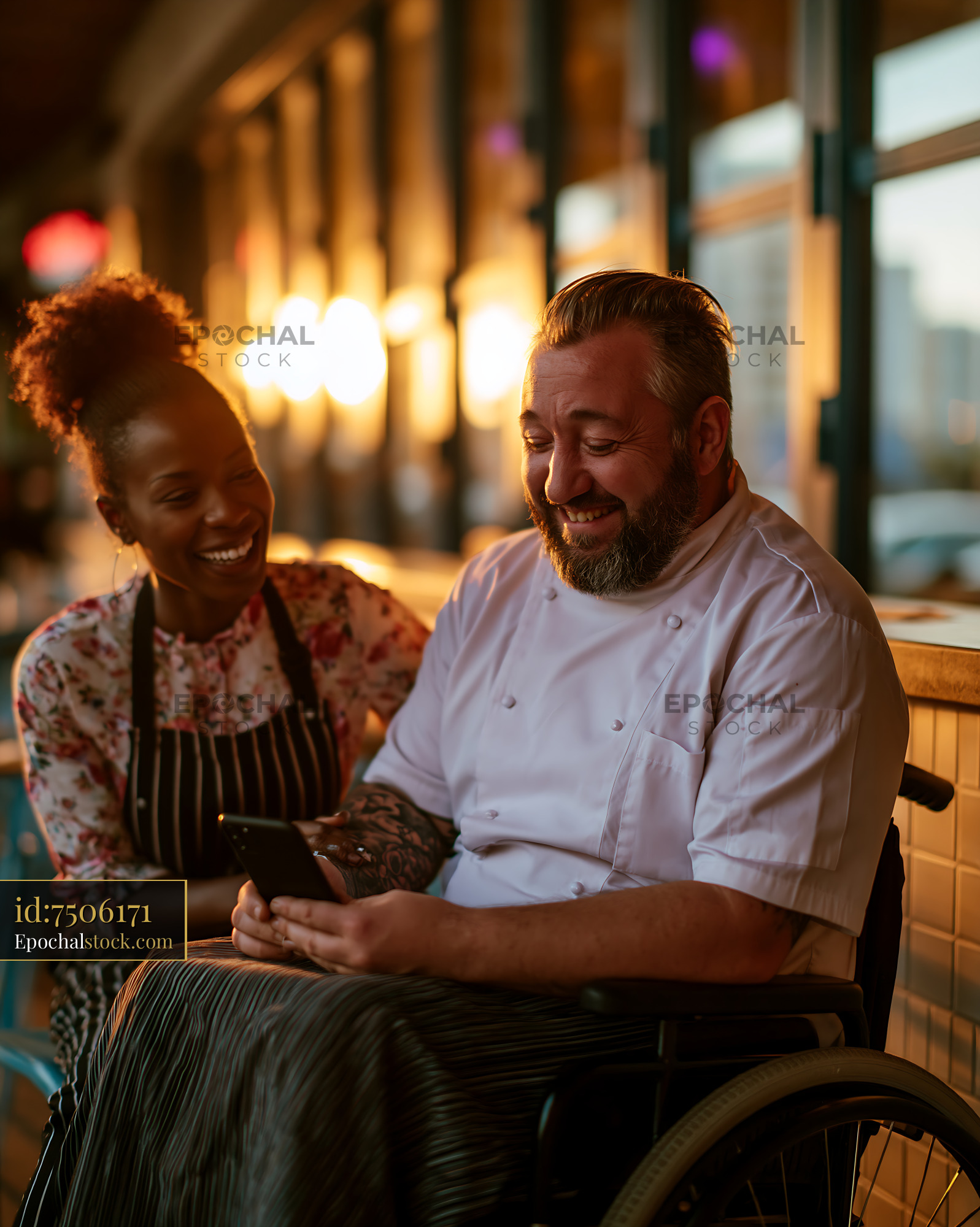 Watermarked full-resolution preview of Chefs enjoying conversation and laughter in a vibrant kitchen