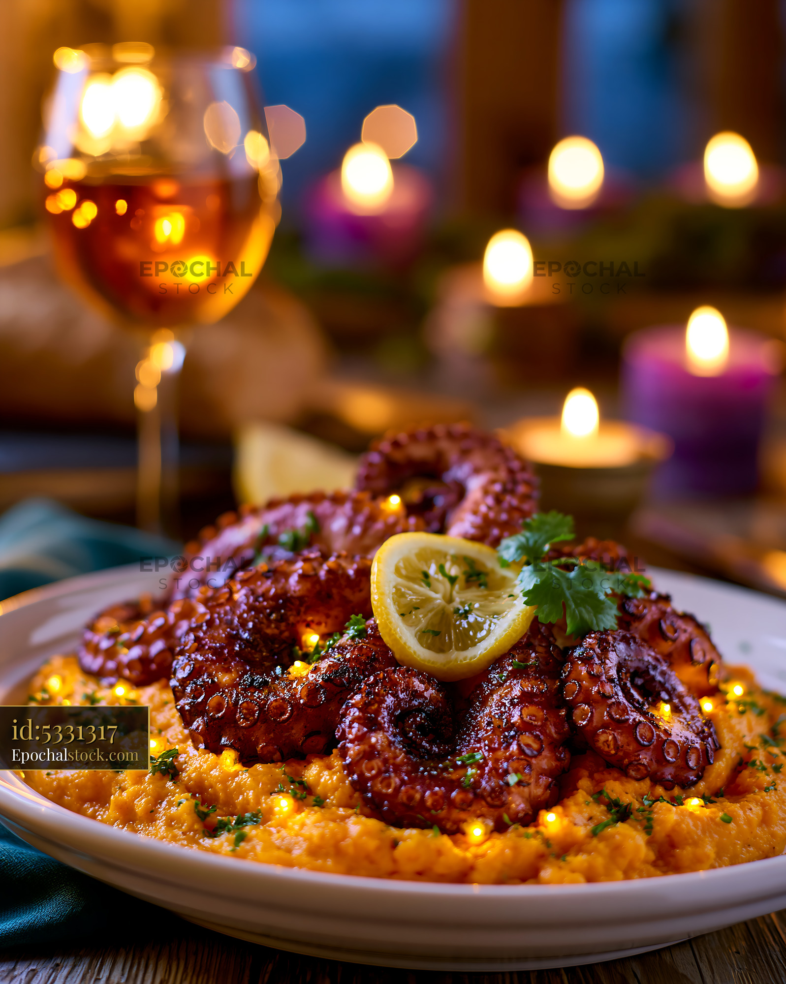 Watermarked full-resolution preview of Cooked octopus served on a plate with lemon and wine beside it