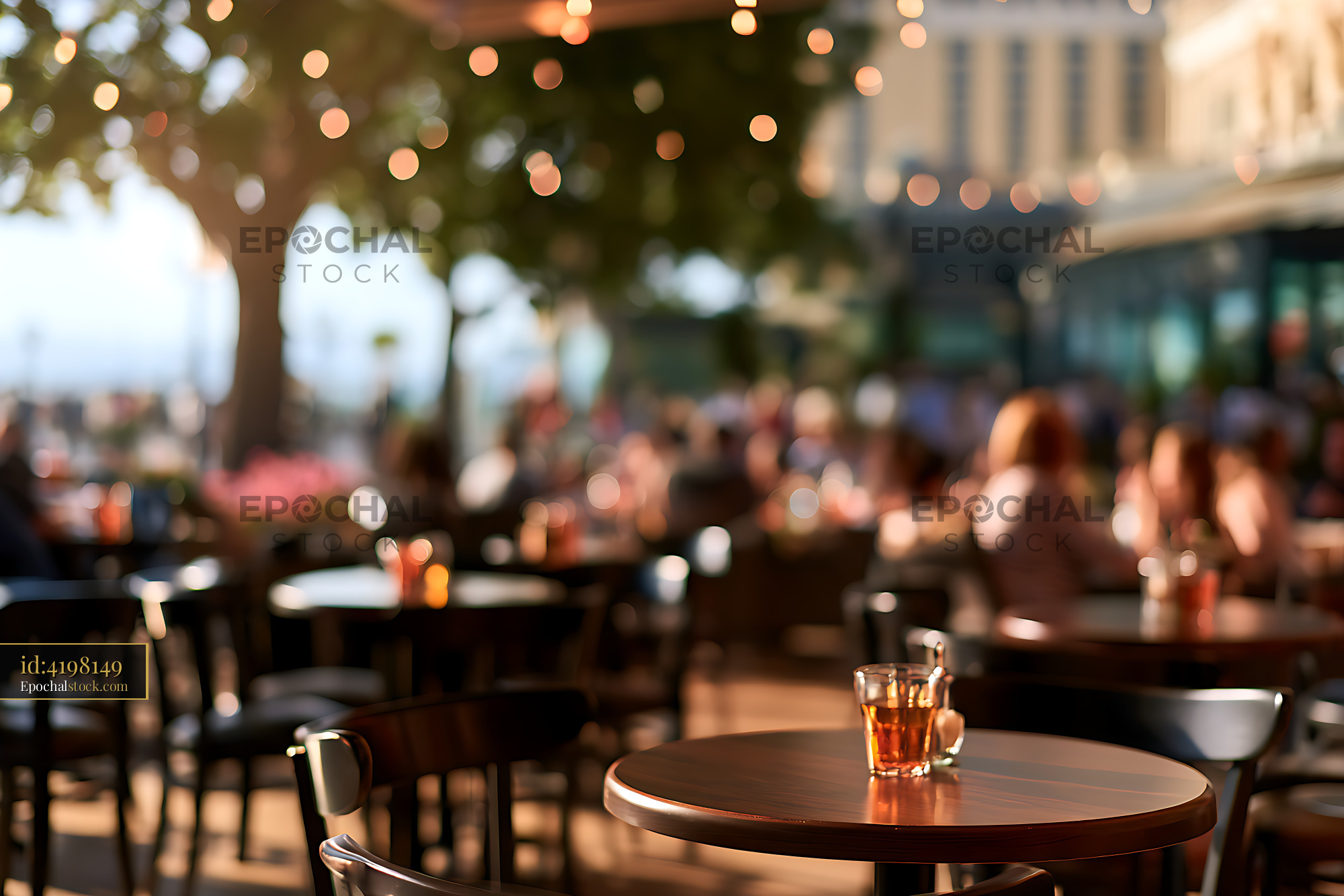 Watermarked full-resolution preview of Warm bokeh at an outdoor cafe