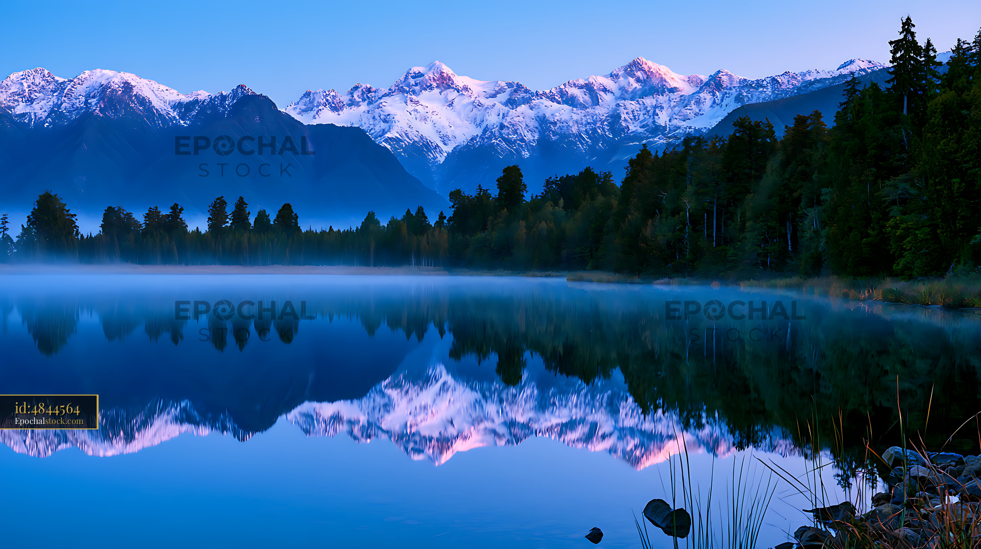 Watermarked full-resolution preview of Mountain reflection in still lake at dawn