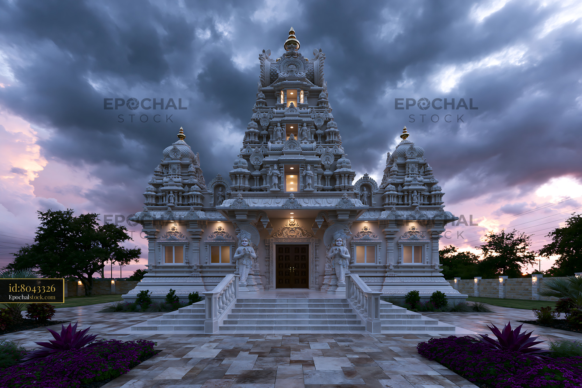 Watermarked full-resolution preview of Hindu temple with intricate carvings and stormy sky during sunset