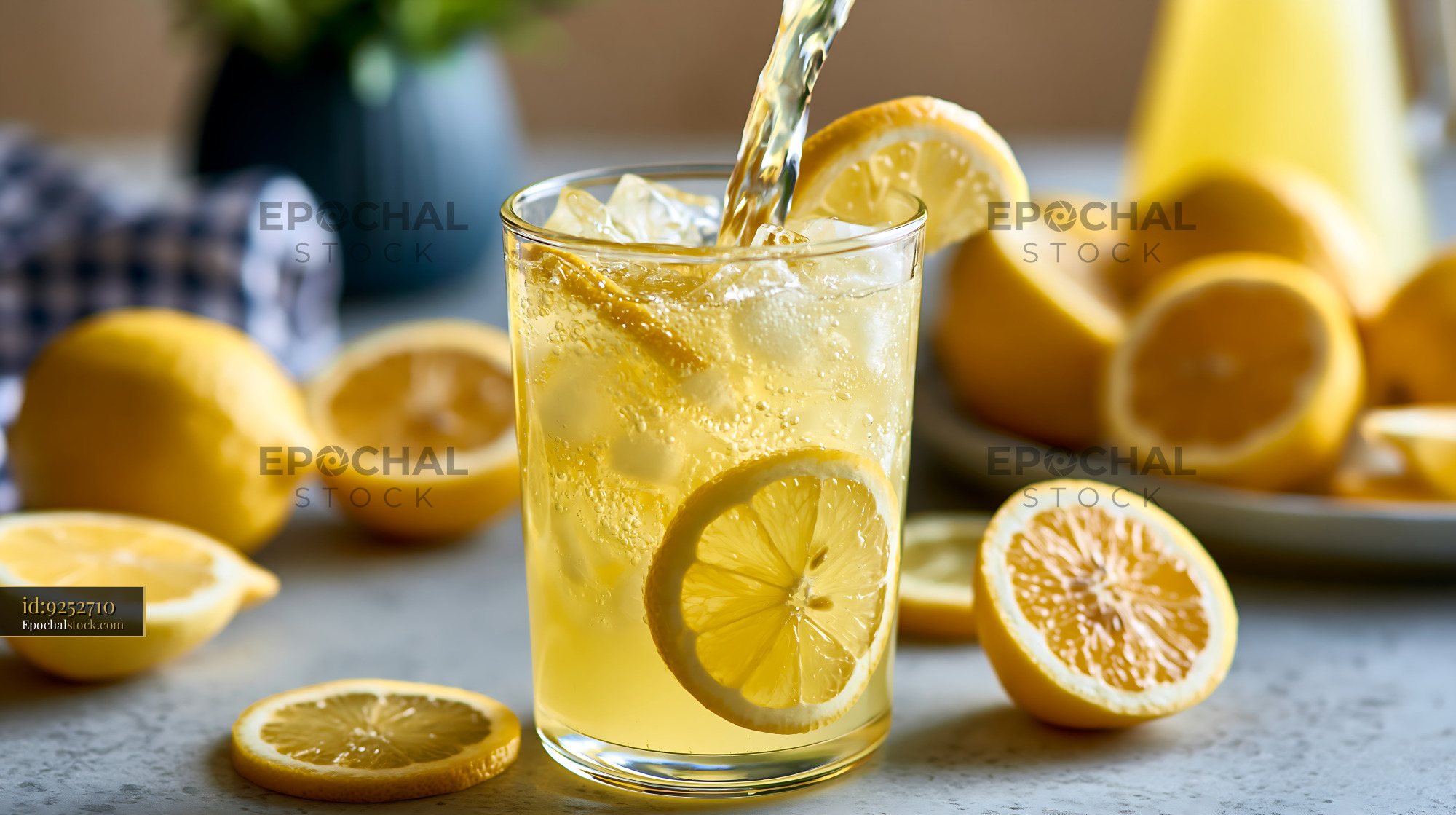 Watermarked full-resolution preview of Refreshing sparkling lemon water with citrus garnish