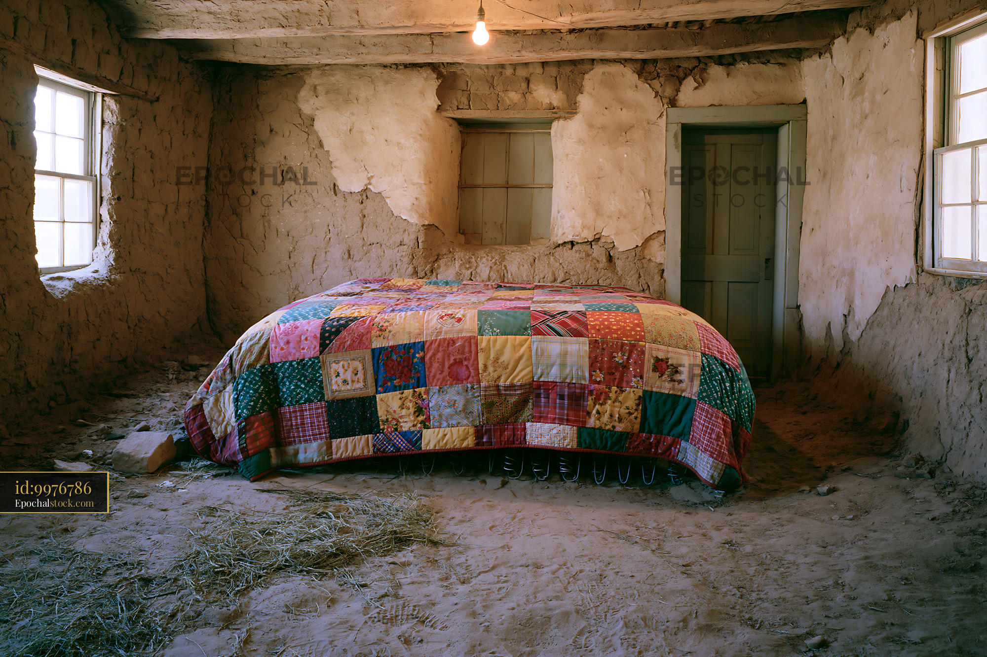 Watermarked full-resolution preview of Old room with a bed covered in a patchwork quilt