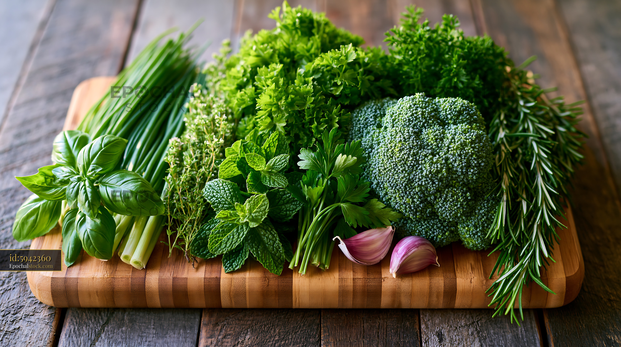 Watermarked full-resolution preview of Fresh herbs and vegetables displayed on a wooden cutting board