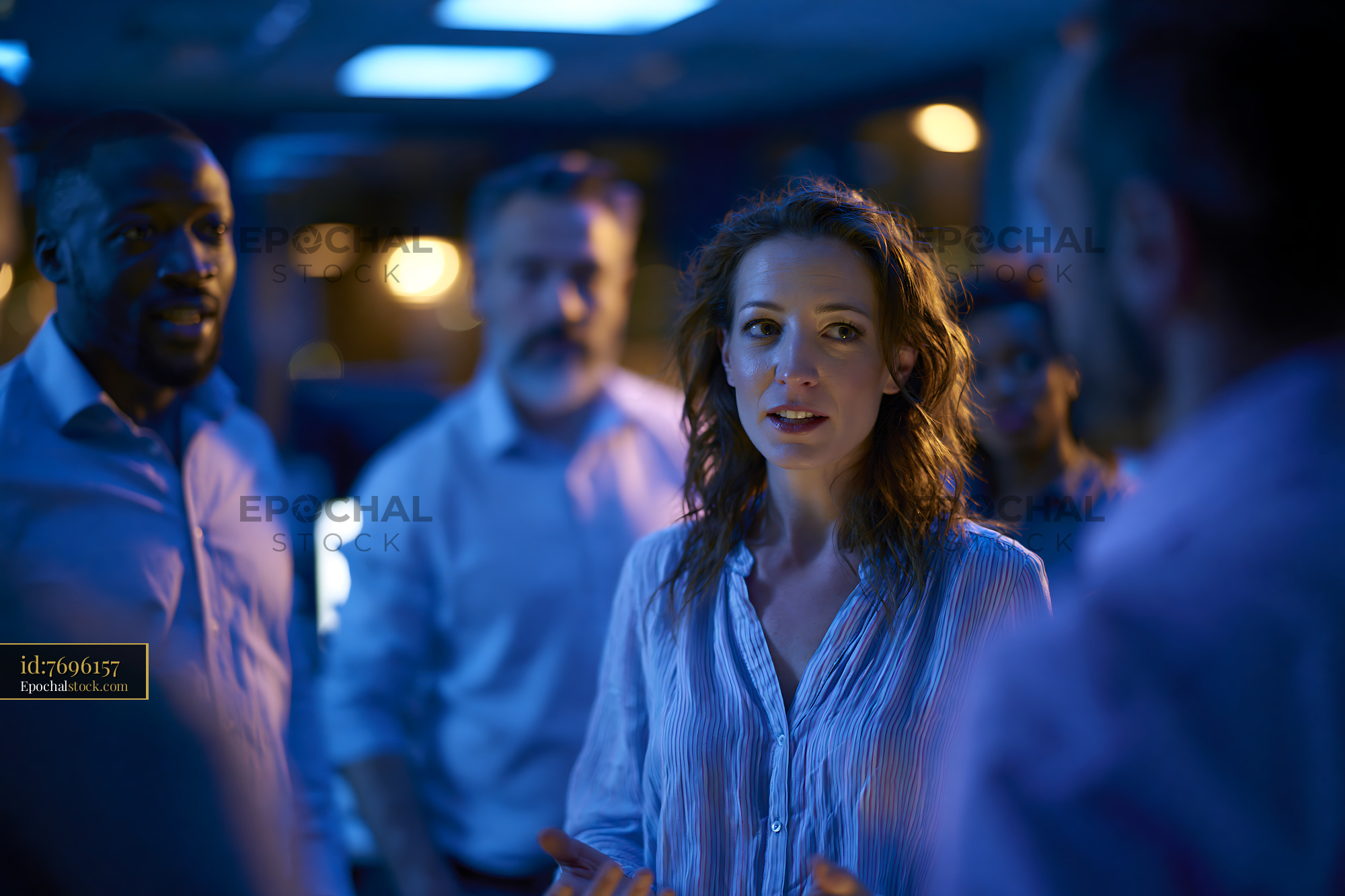 Security Awareness Training Team Discussion in Blue Lighting - stock photo