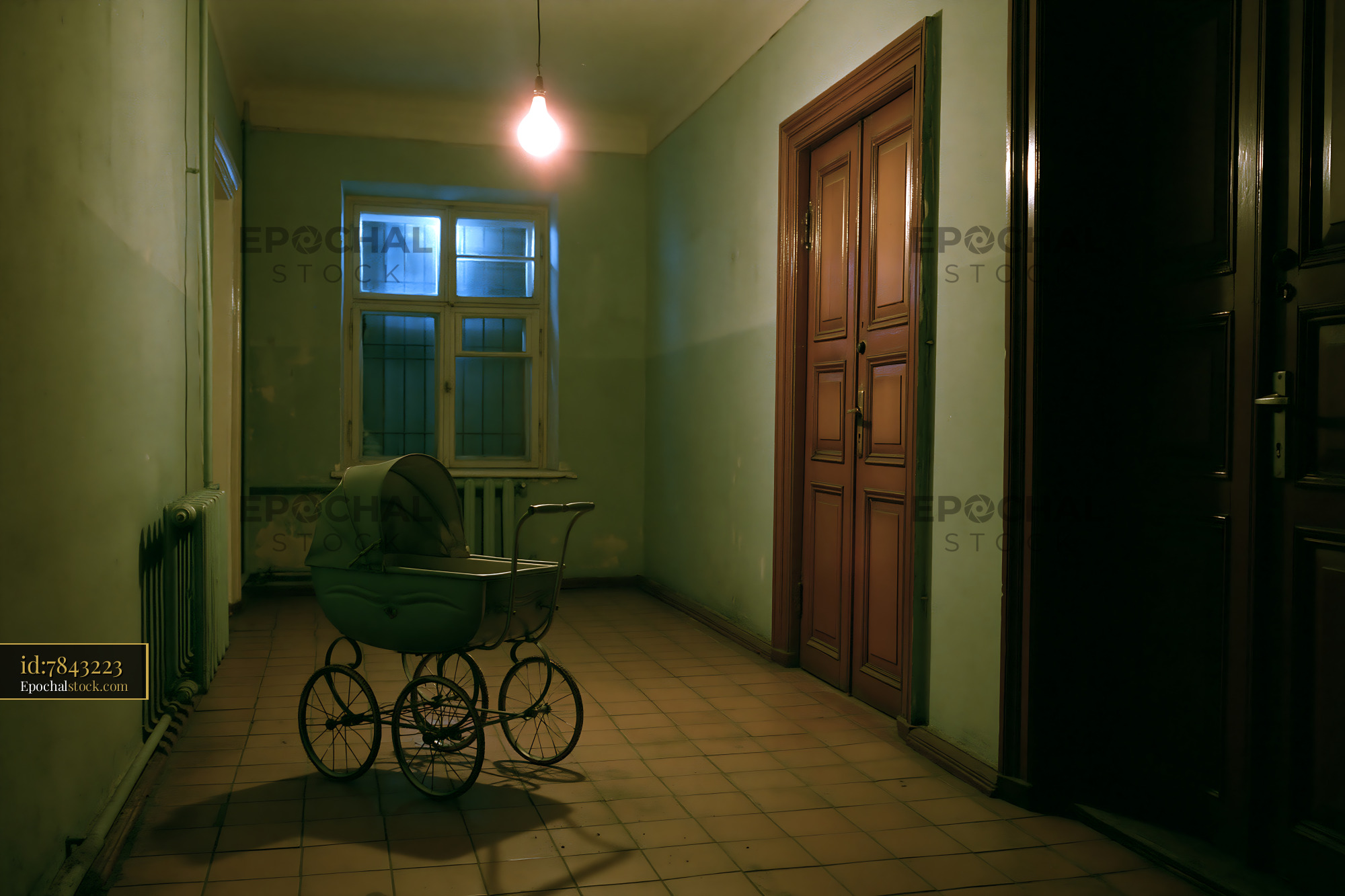 Watermarked full-resolution preview of Empty hallway with a baby stroller in dim light
