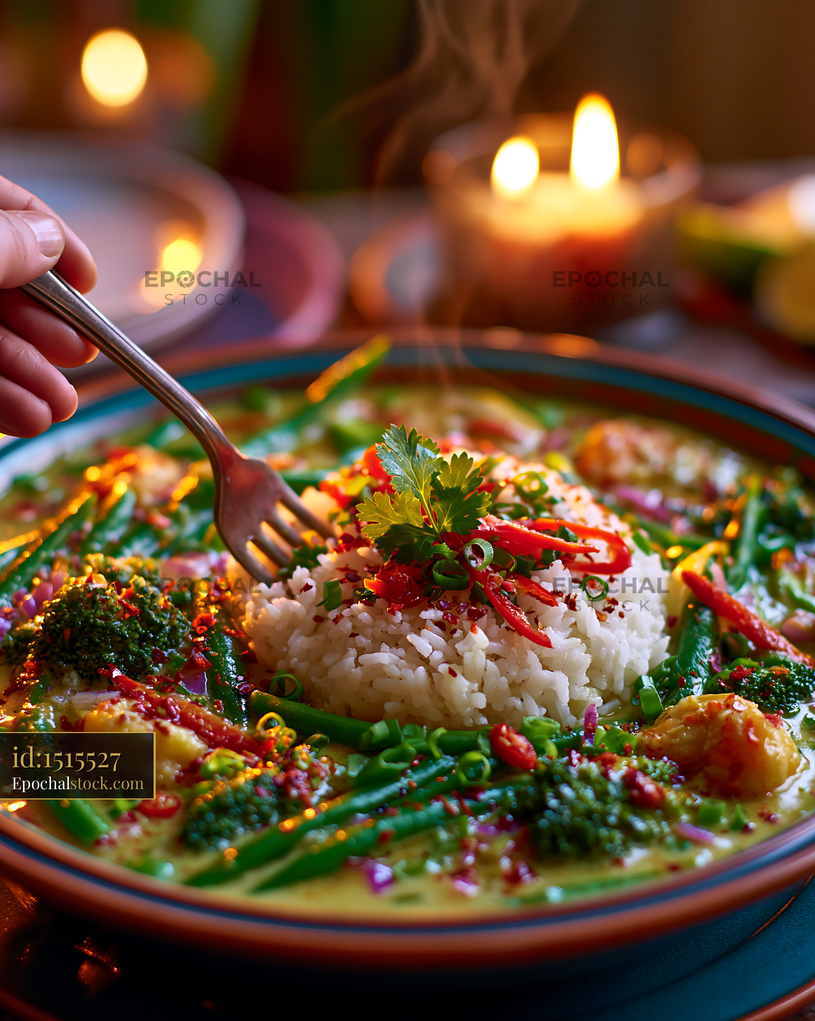 Watermarked full-resolution preview of Colorful rice and vegetables with fork and warm candlelight
