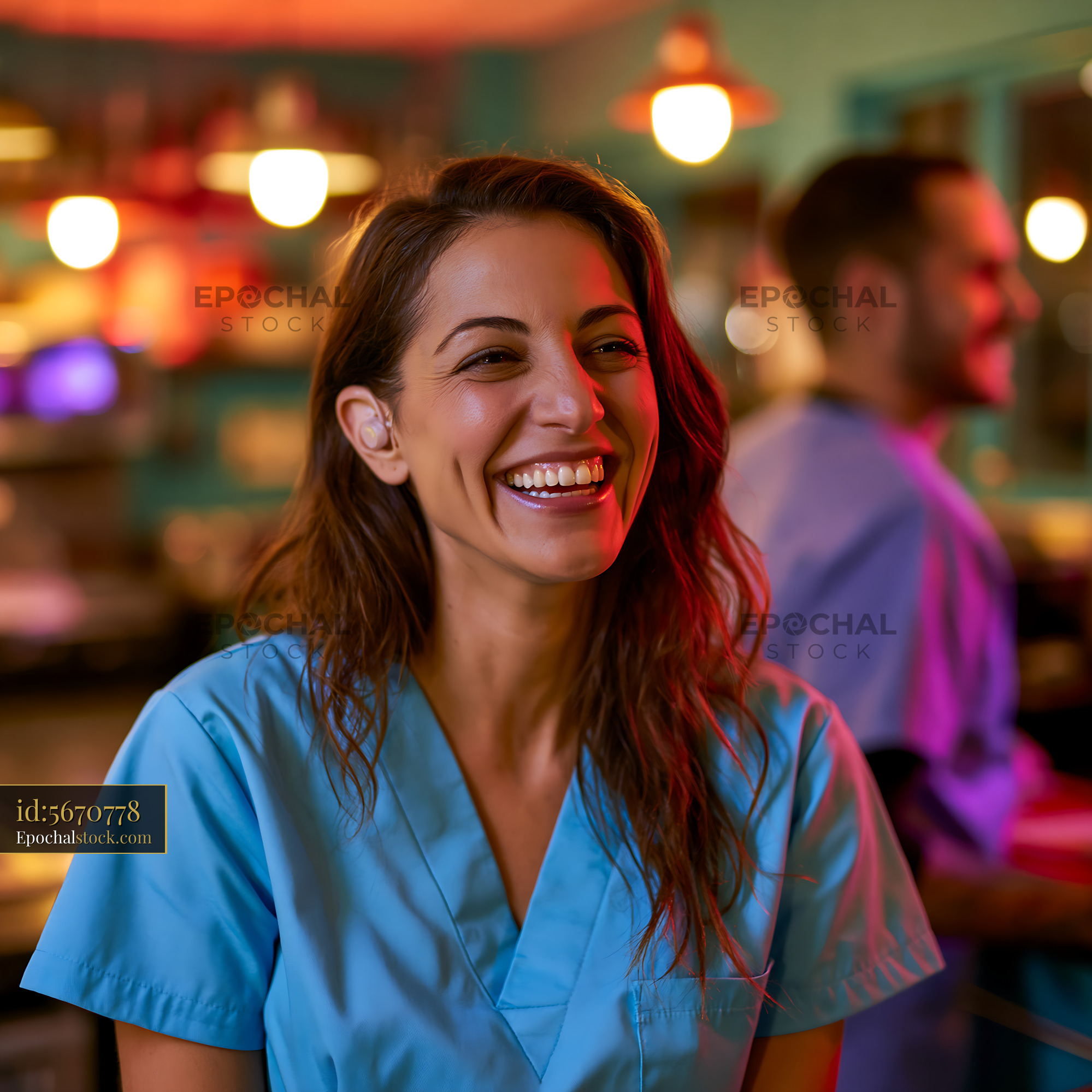Watermarked full-resolution preview of Healthcare worker smiling in a vibrant setting