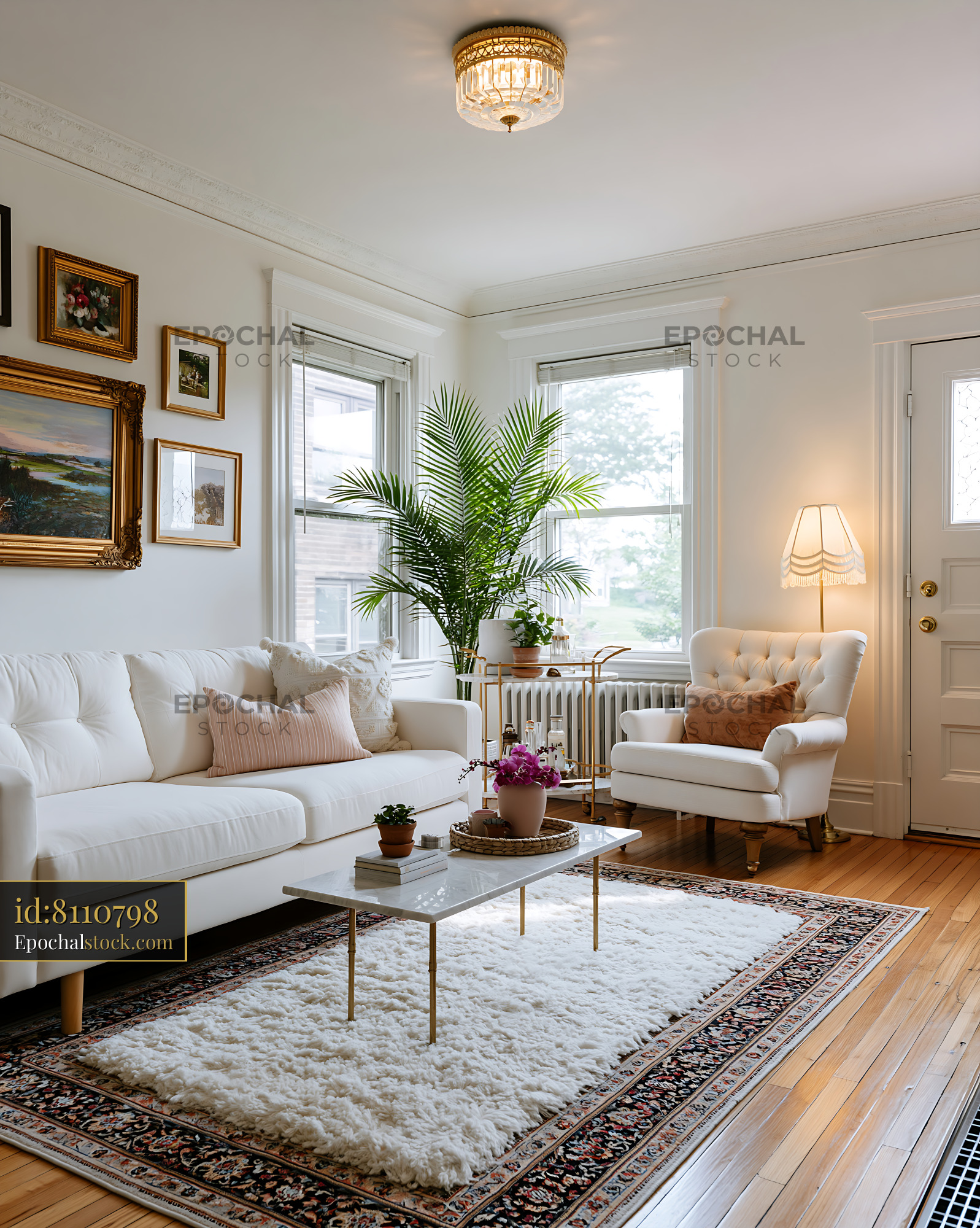 Watermarked full-resolution preview of Bright living room with white furniture and large windows