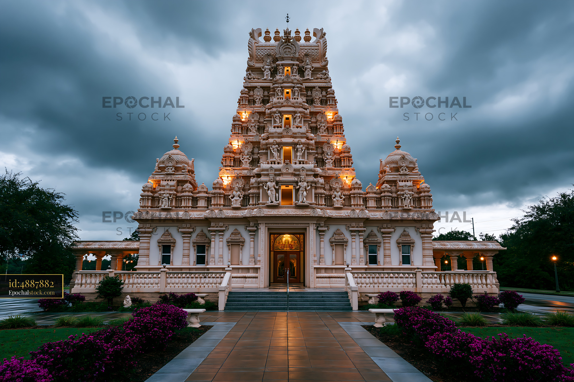 Watermarked full-resolution preview of Hindu temple with ornate architecture under cloudy sky