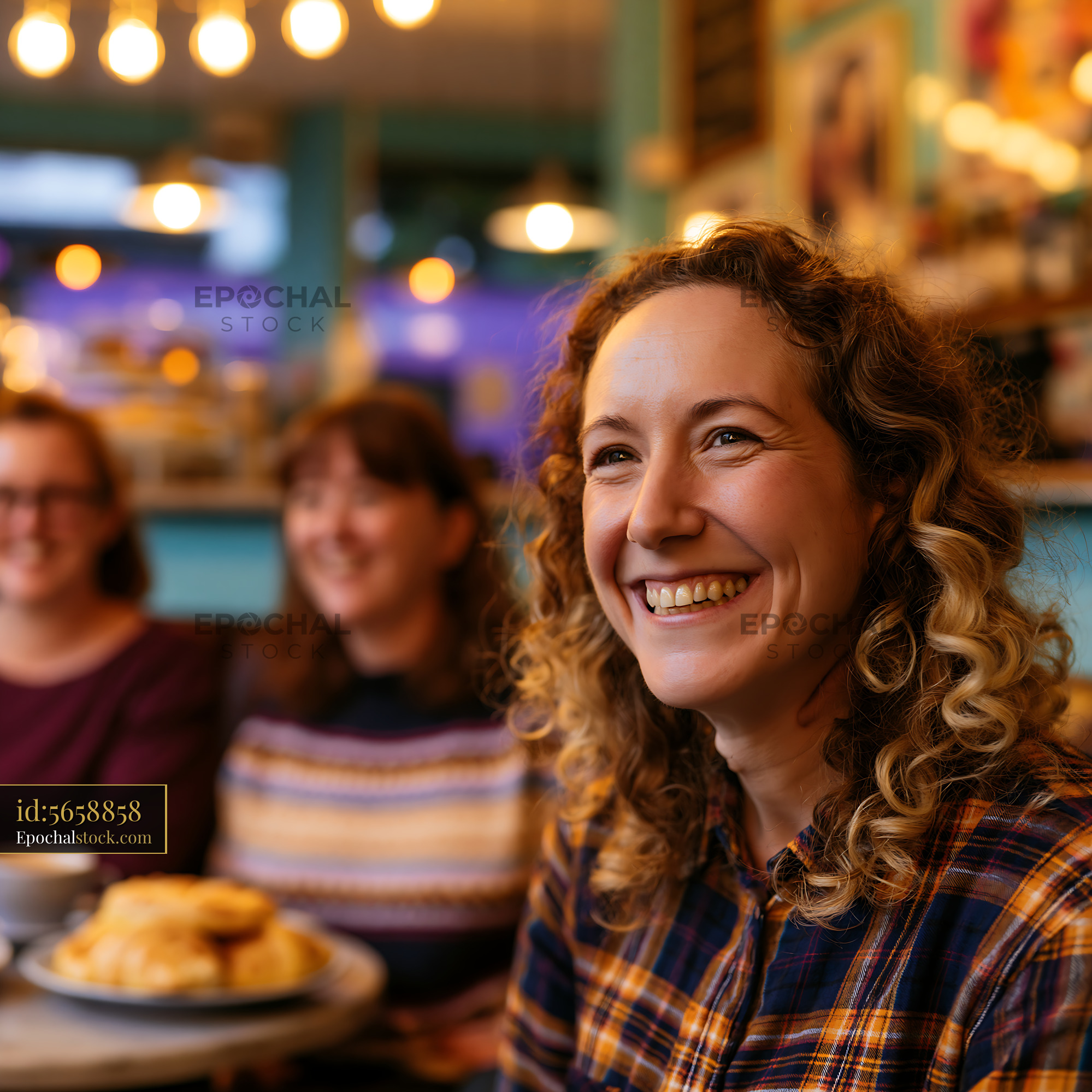 Watermarked full-resolution preview of Friends enjoy coffee and pastries in a cafe setting