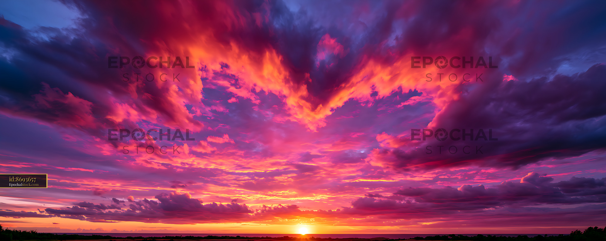Watermarked full-resolution preview of Vibrant sunset over a landscape with colorful clouds