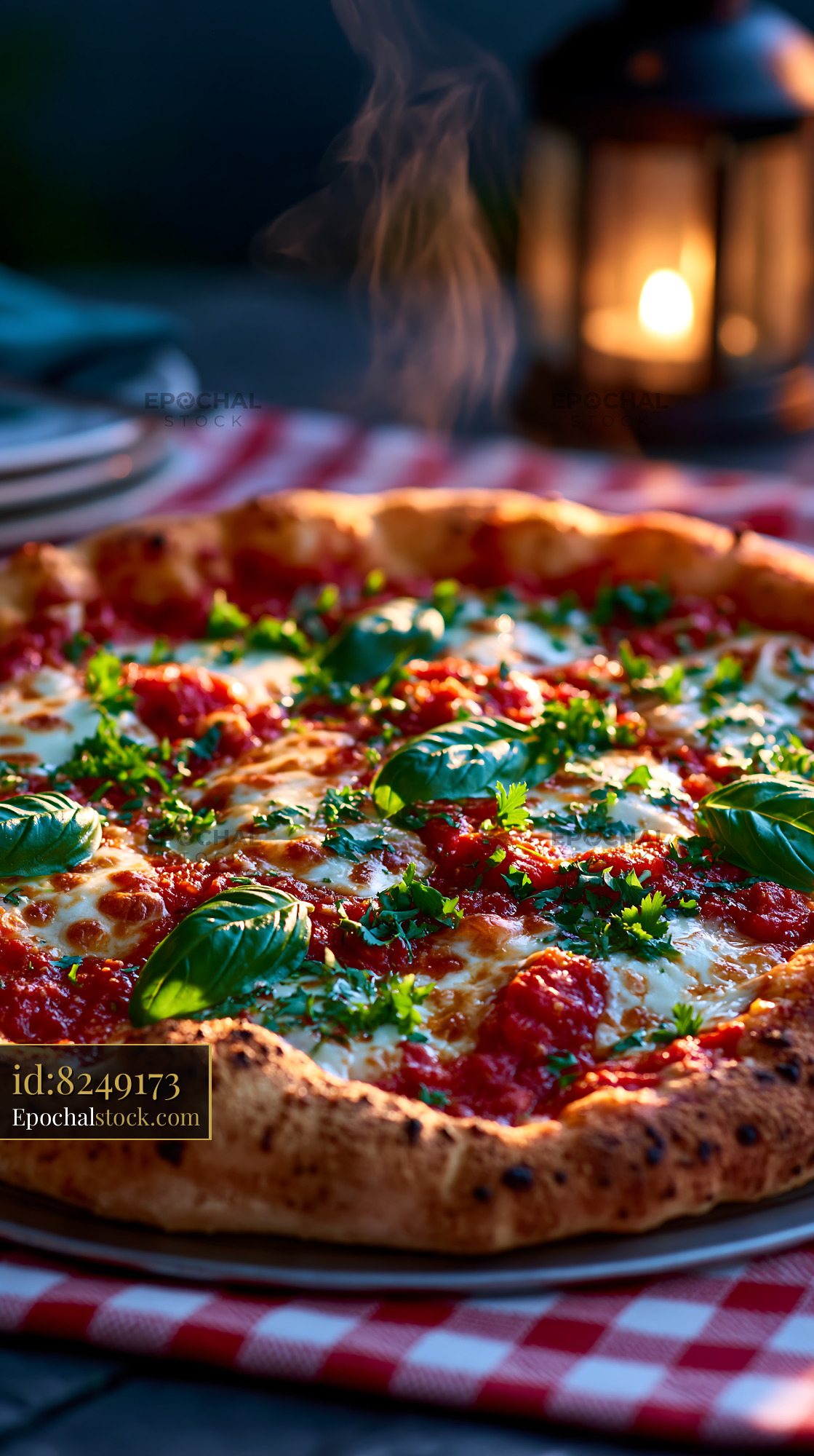 Watermarked full-resolution preview of Pizza with basil and tomato sauce on a checked tablecloth