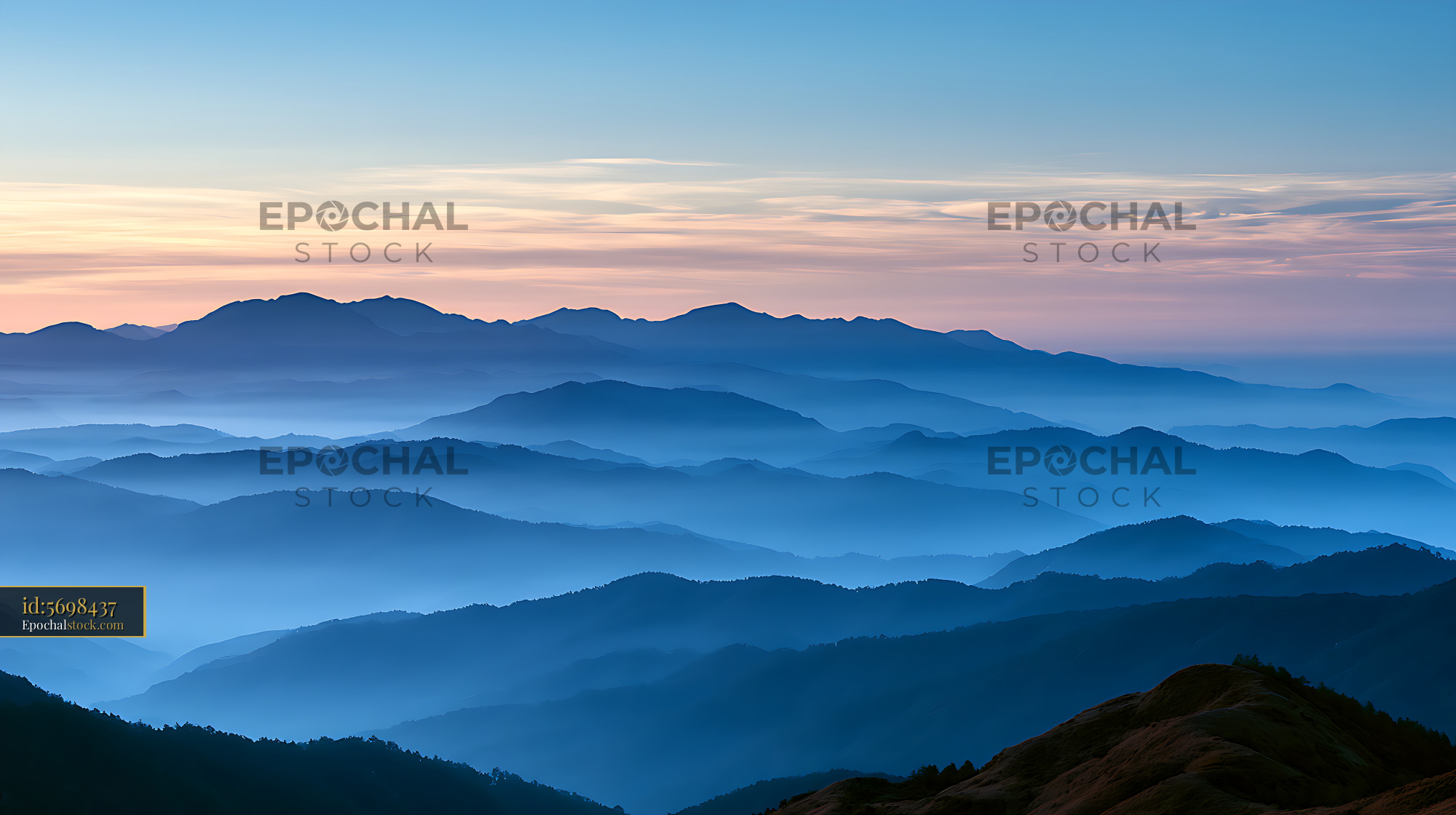 Watermarked full-resolution preview of Blue mountain landscape with layered ridges at sunset