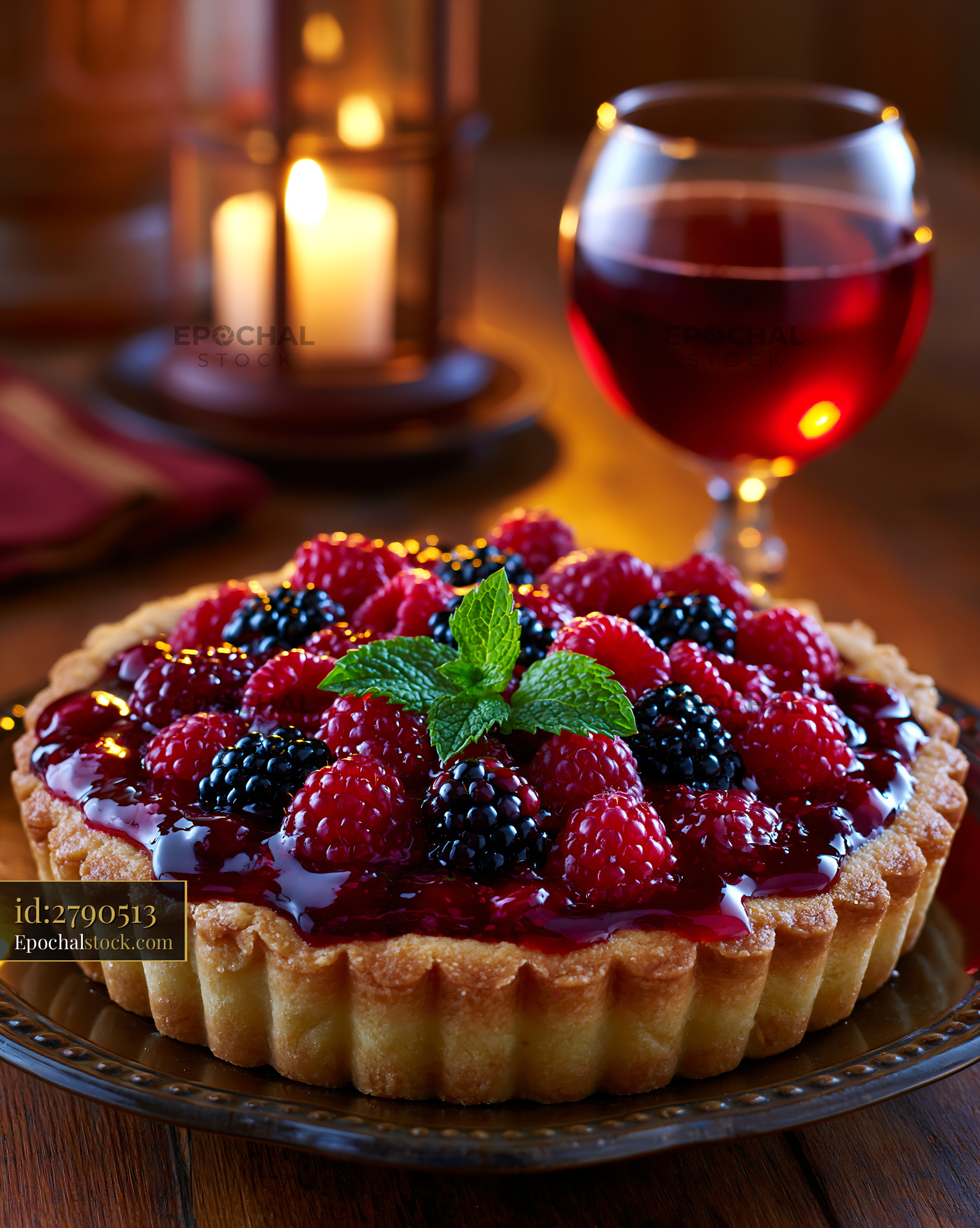 Watermarked full-resolution preview of Berry tart, red wine, and candles in a warm dining scene