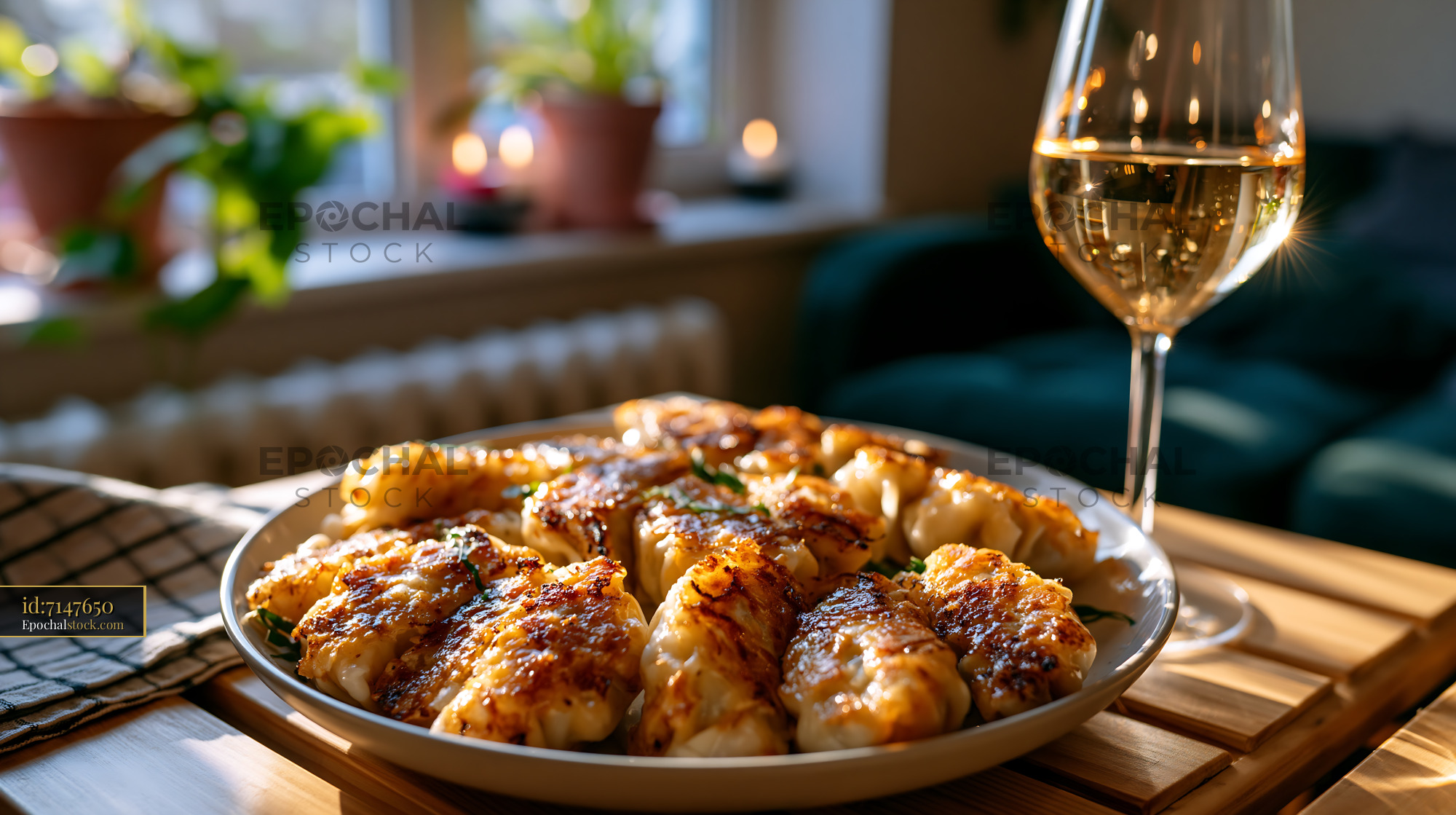 Watermarked full-resolution preview of Delicious dish served on a plate with wine in a cozy setting