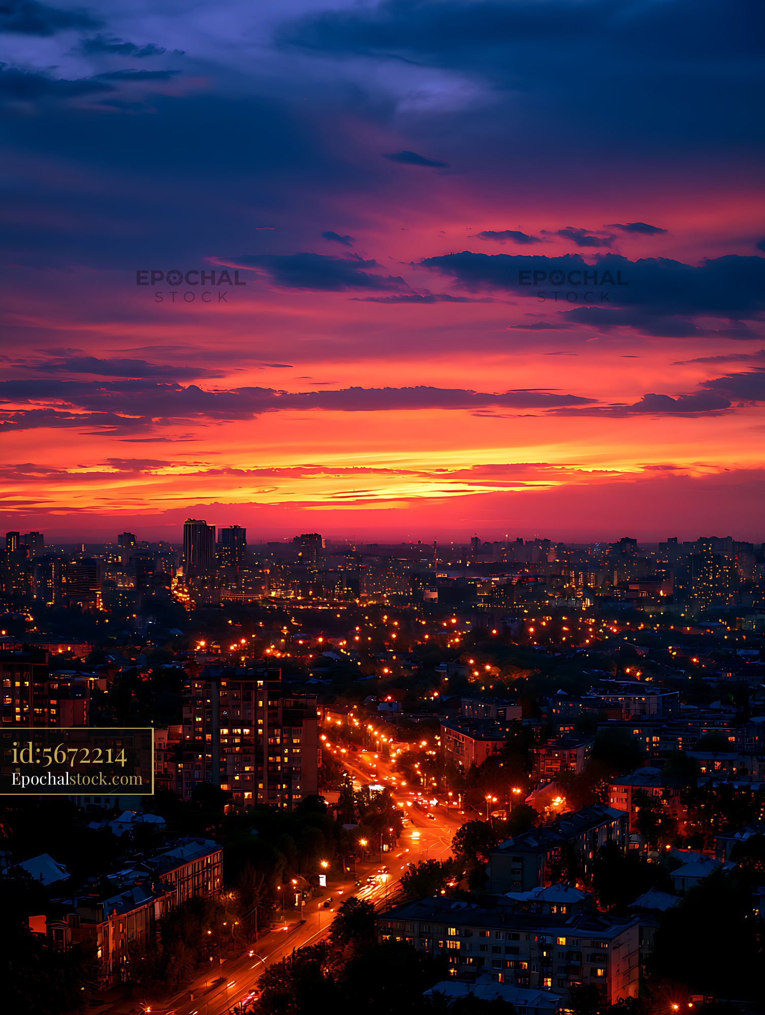 Watermarked full-resolution preview of Vibrant sunset over an illuminated city