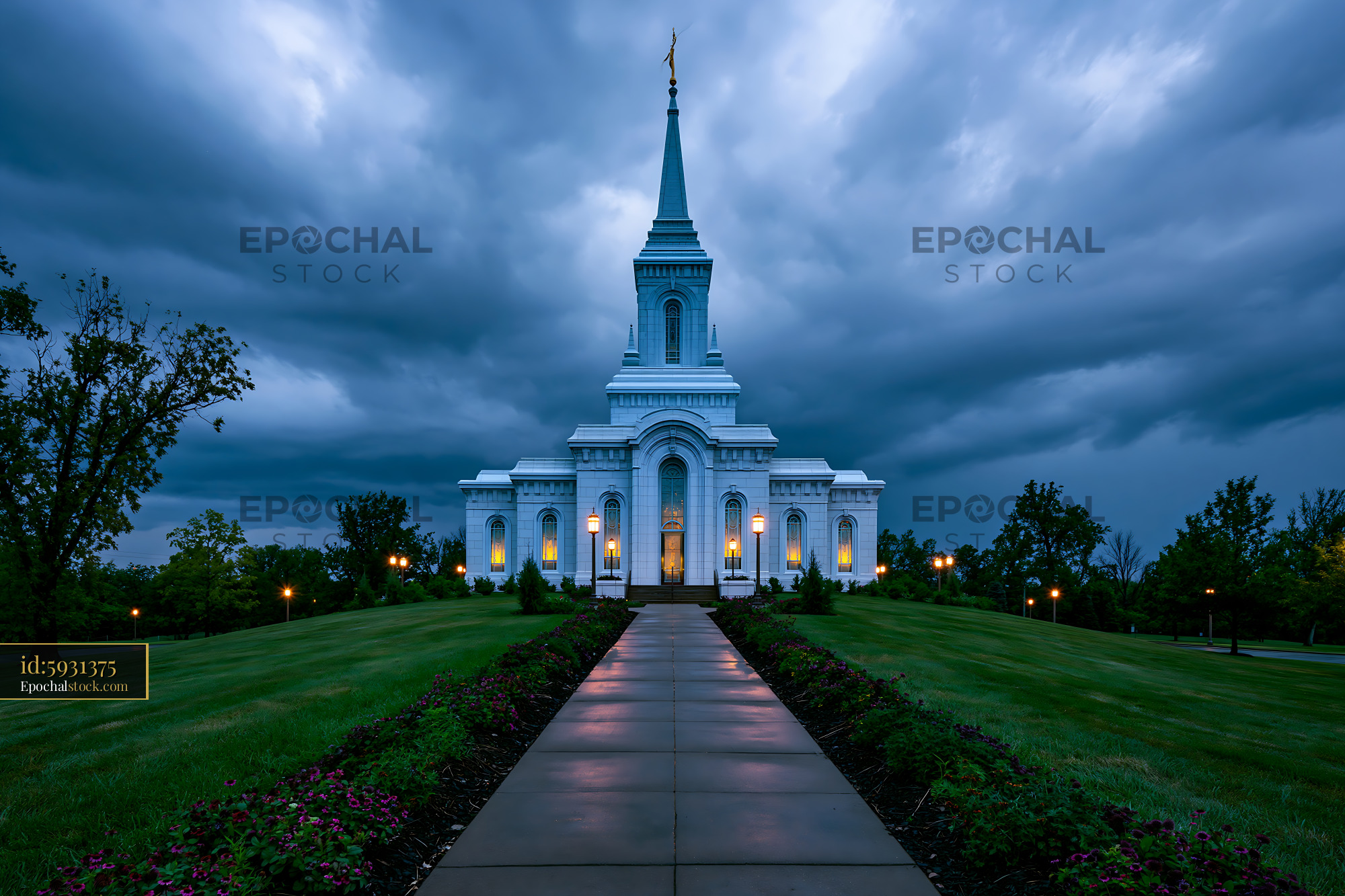 Watermarked full-resolution preview of Stormy sky over a white church illuminated at dusk