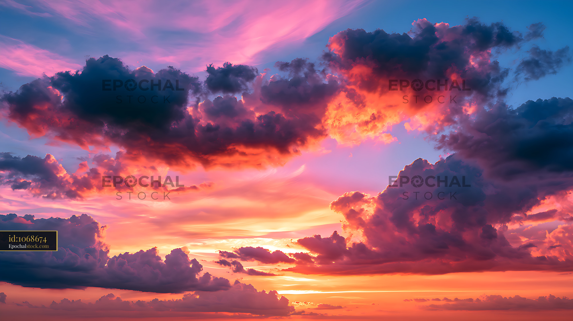 Watermarked full-resolution preview of Vivid sunset cloudscape in pink, orange, and purple