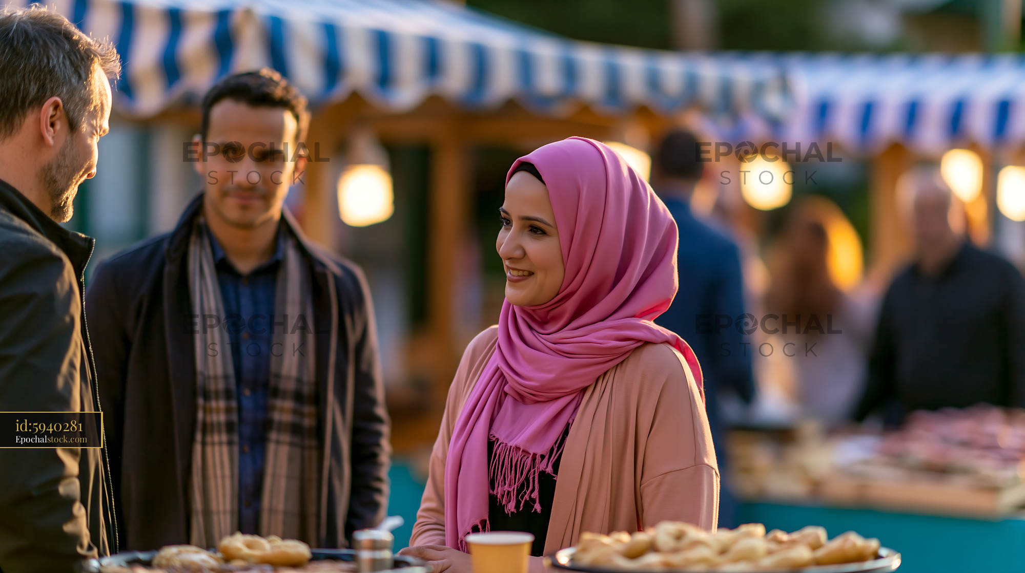 Colleagues Sharing Food With Fasting Coworker During Event - stock photo