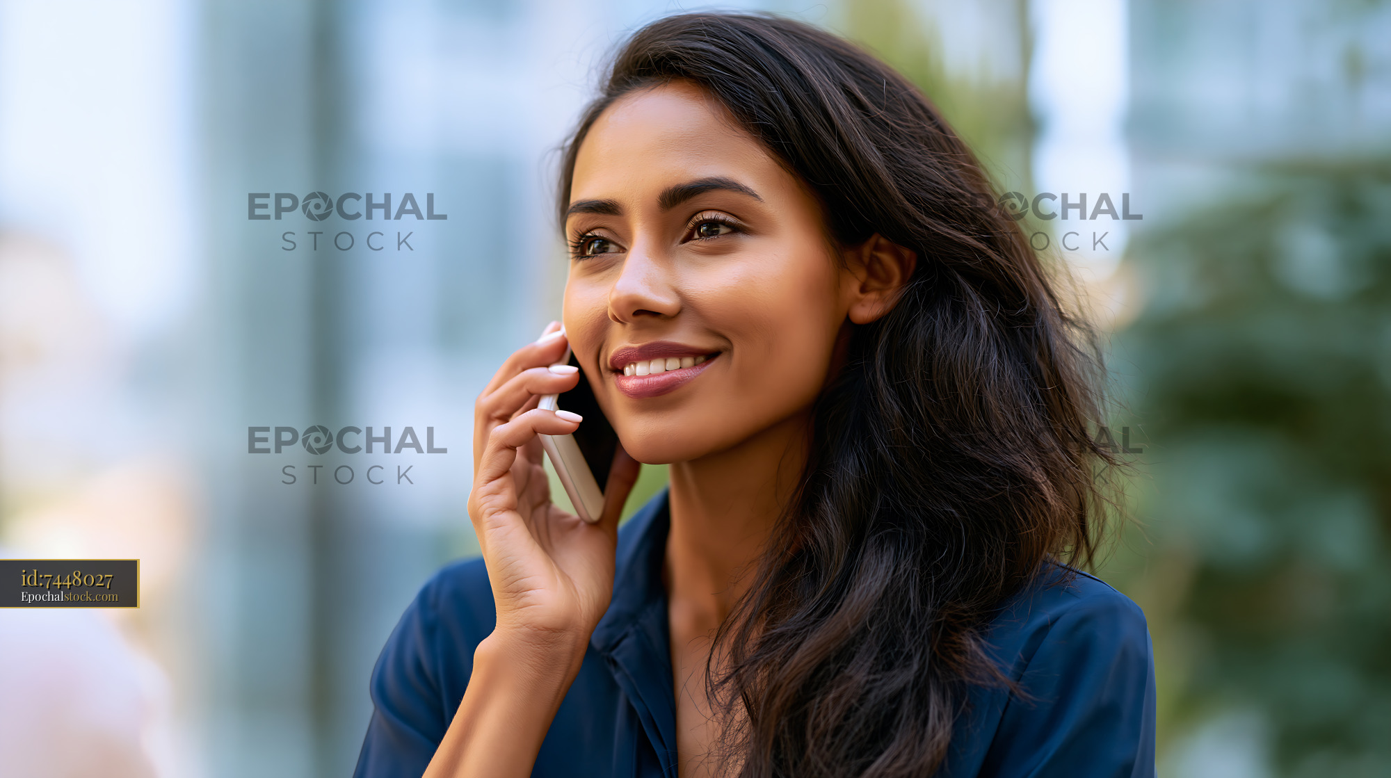 Woman Talking on the Phone in an Outdoor Setting - stock photo
