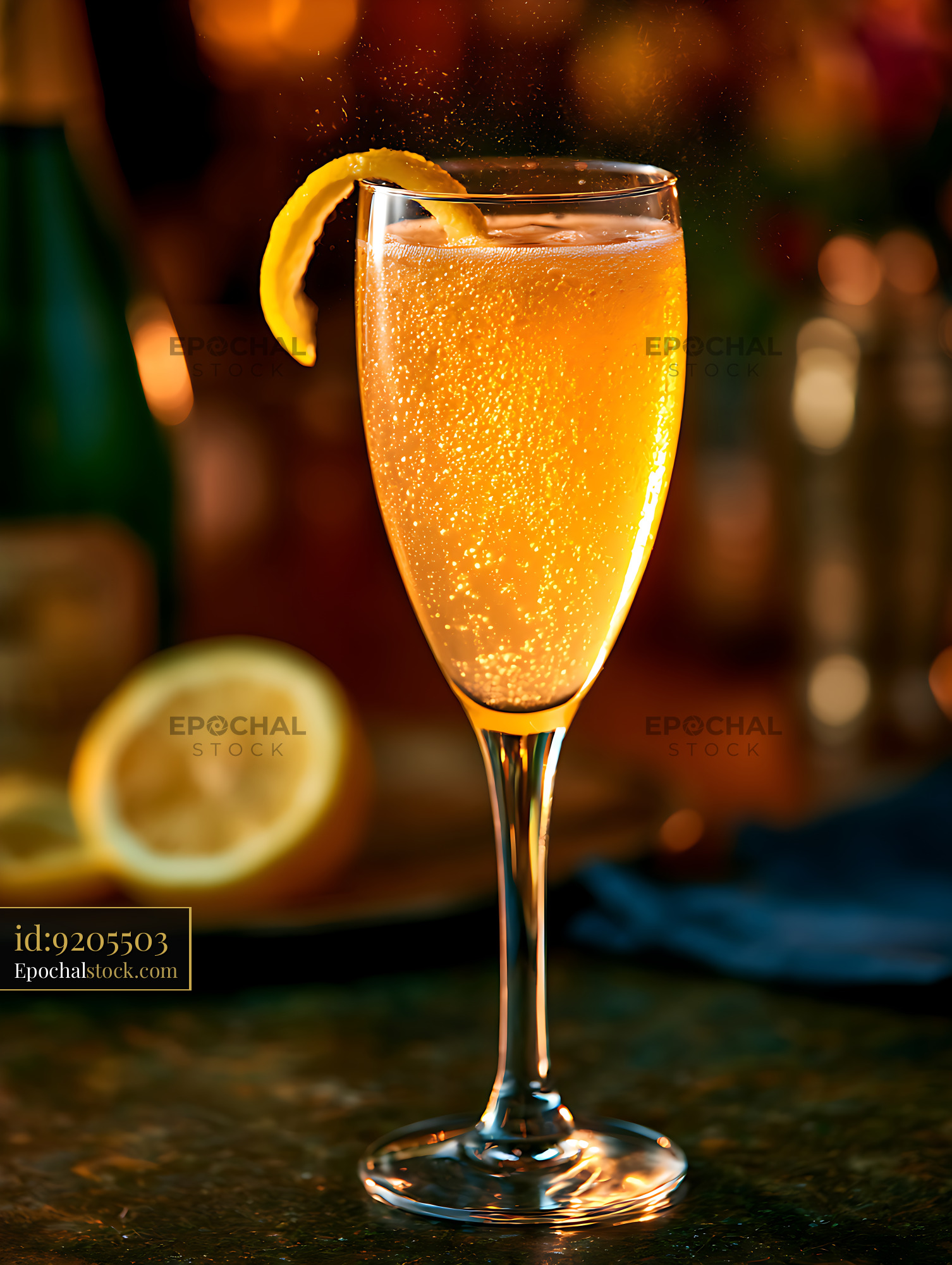 Watermarked full-resolution preview of Golden sparkling citrus beverage with lemon garnish