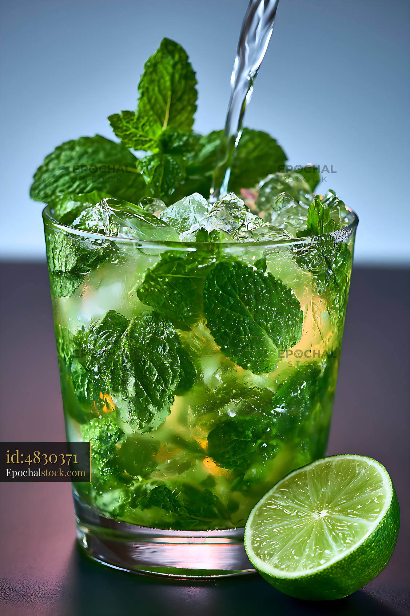 Watermarked full-resolution preview of Refreshing mojito drink with mint and lime