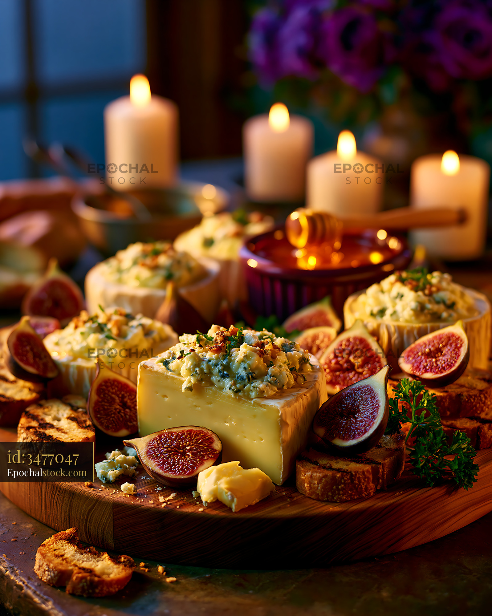 Watermarked full-resolution preview of Cheese platter with figs and bread on a wooden board