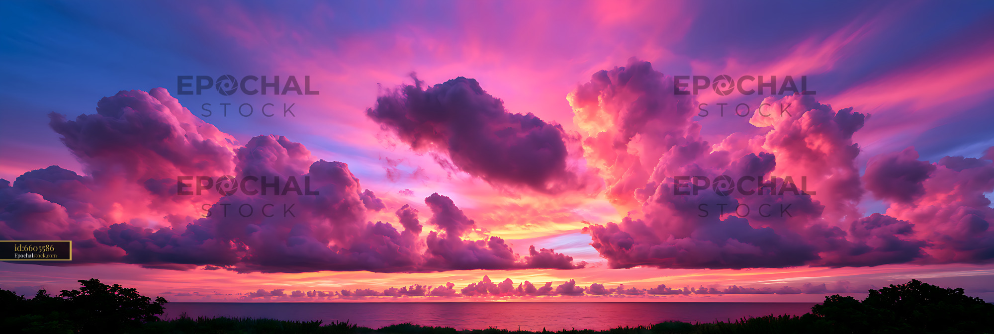 Watermarked full-resolution preview of Vivid sunset cloudscape above a calm sea