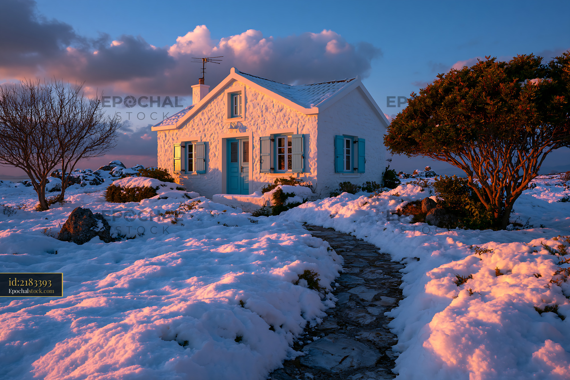 Watermarked full-resolution preview of Snow-covered house with blue shutters at sunset in winter