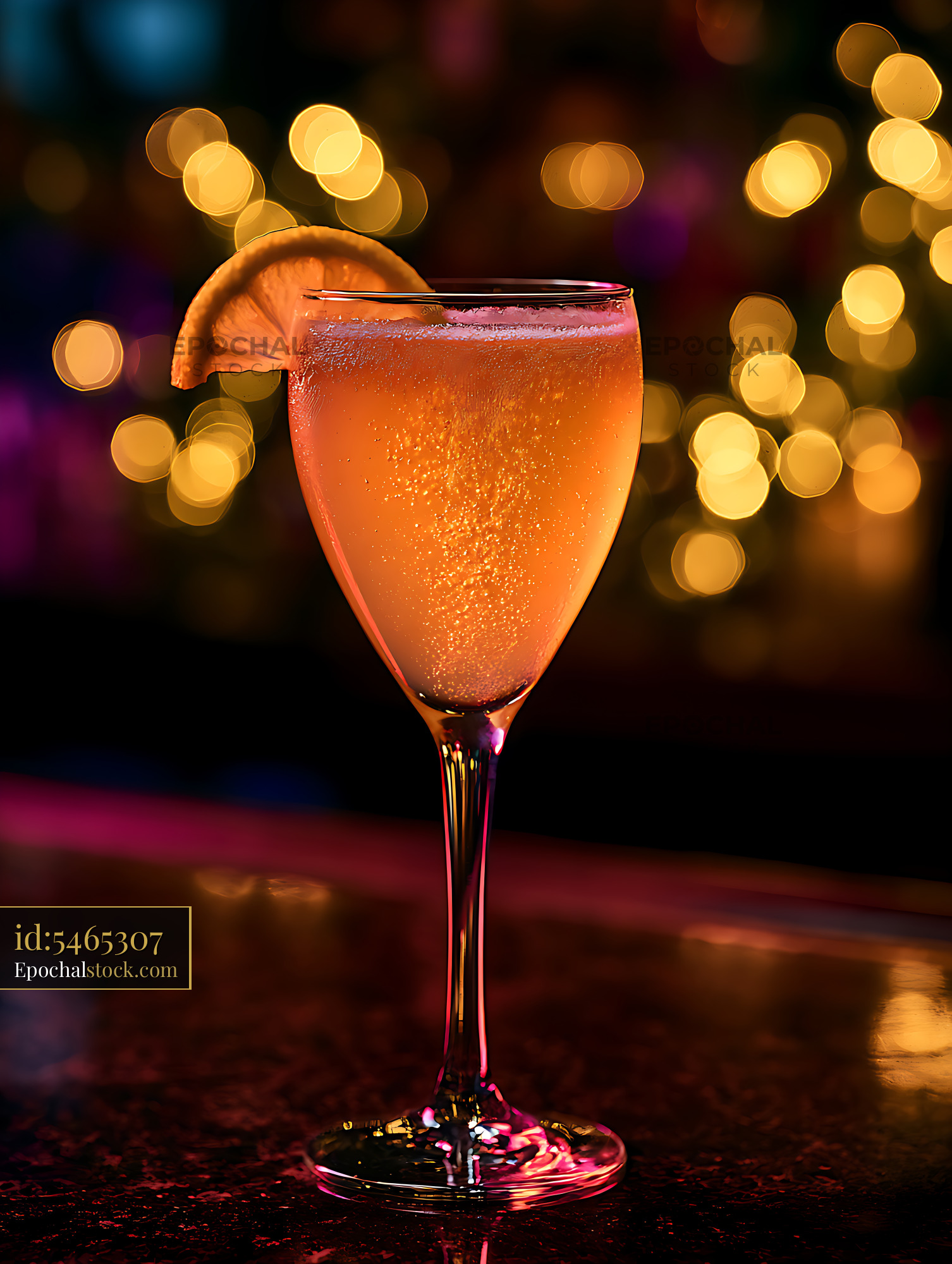 Watermarked full-resolution preview of Sparkling orange cocktail with colorful bokeh