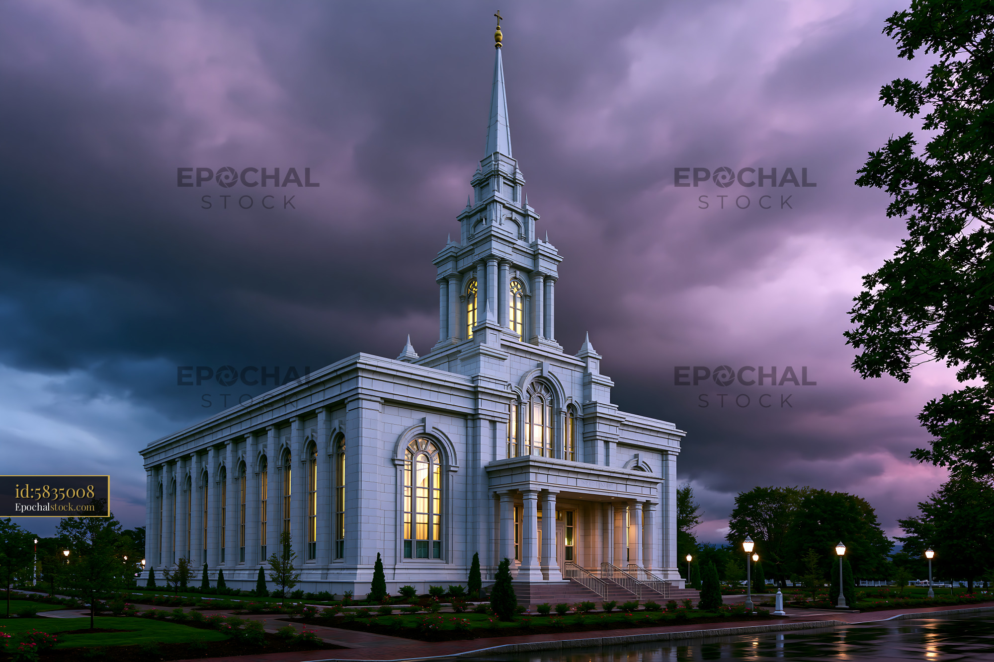 Watermarked full-resolution preview of Tall building with spire against a dark sky at dusk