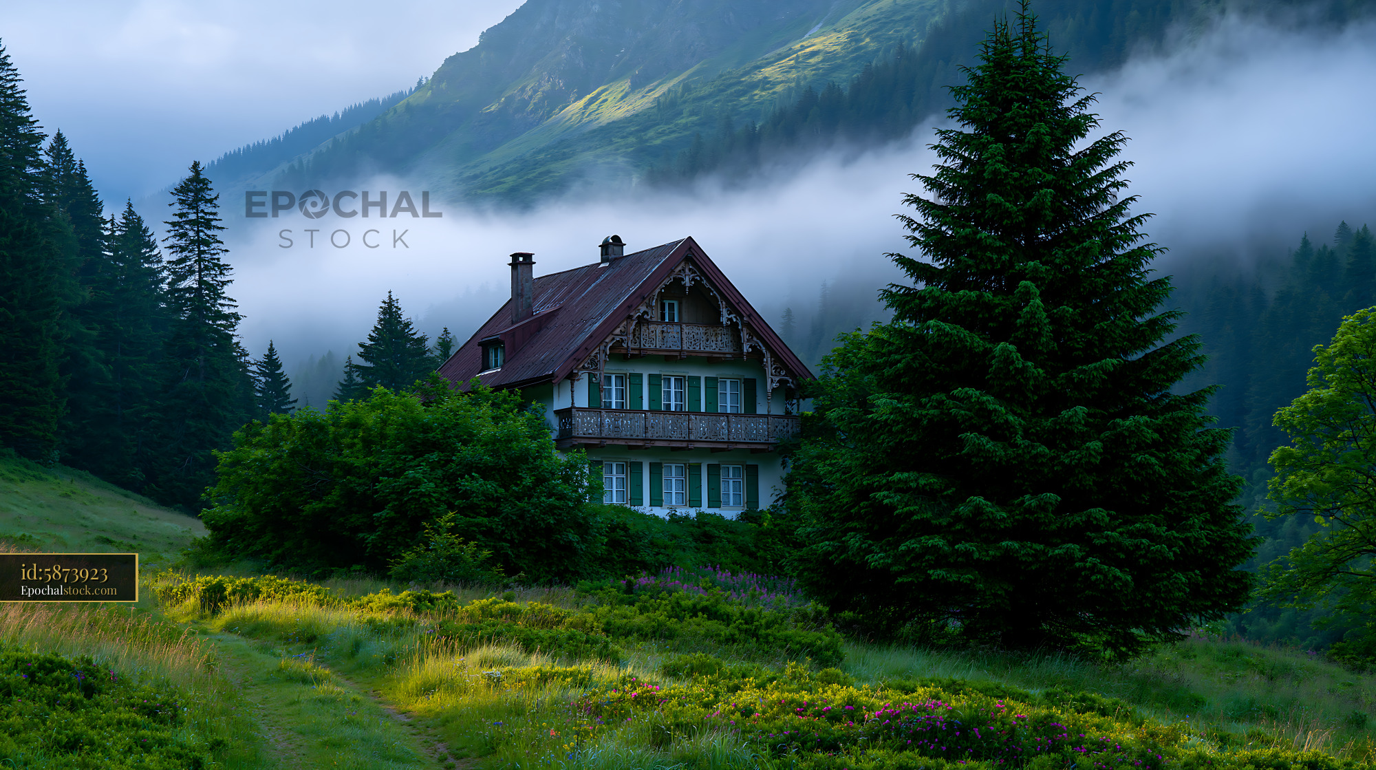 Watermarked full-resolution preview of Fog surrounds a house in the mountains during early morning hours