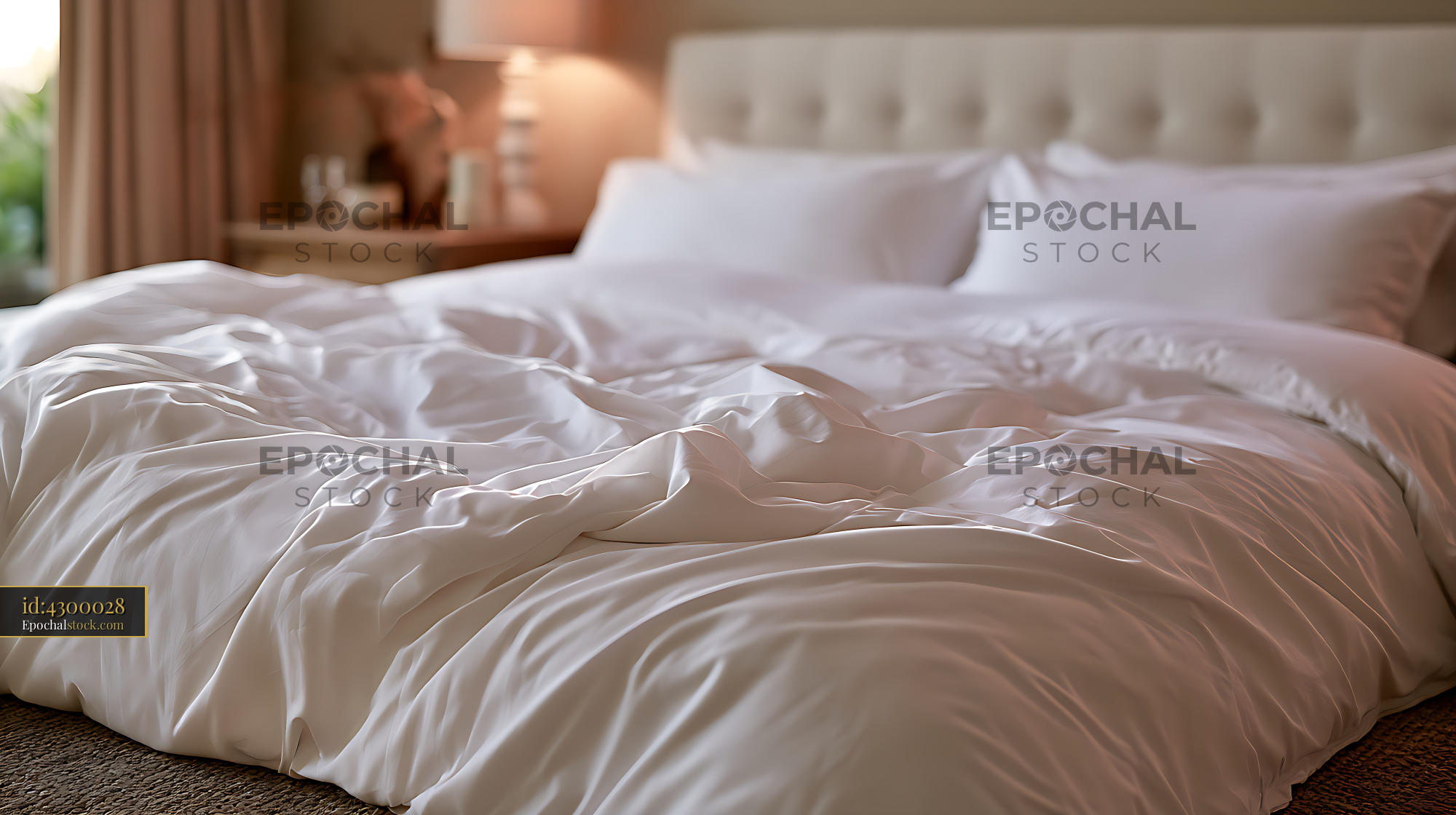 Watermarked full-resolution preview of Rumpled white bedding on an unmade bed