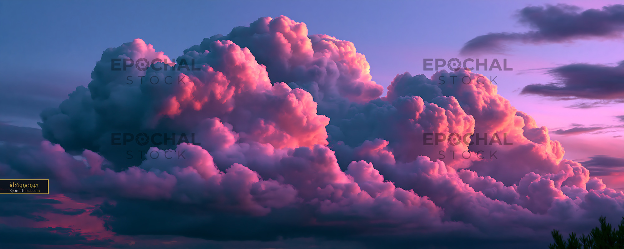 Watermarked full-resolution preview of Colorful clouds during sunset in a clear sky