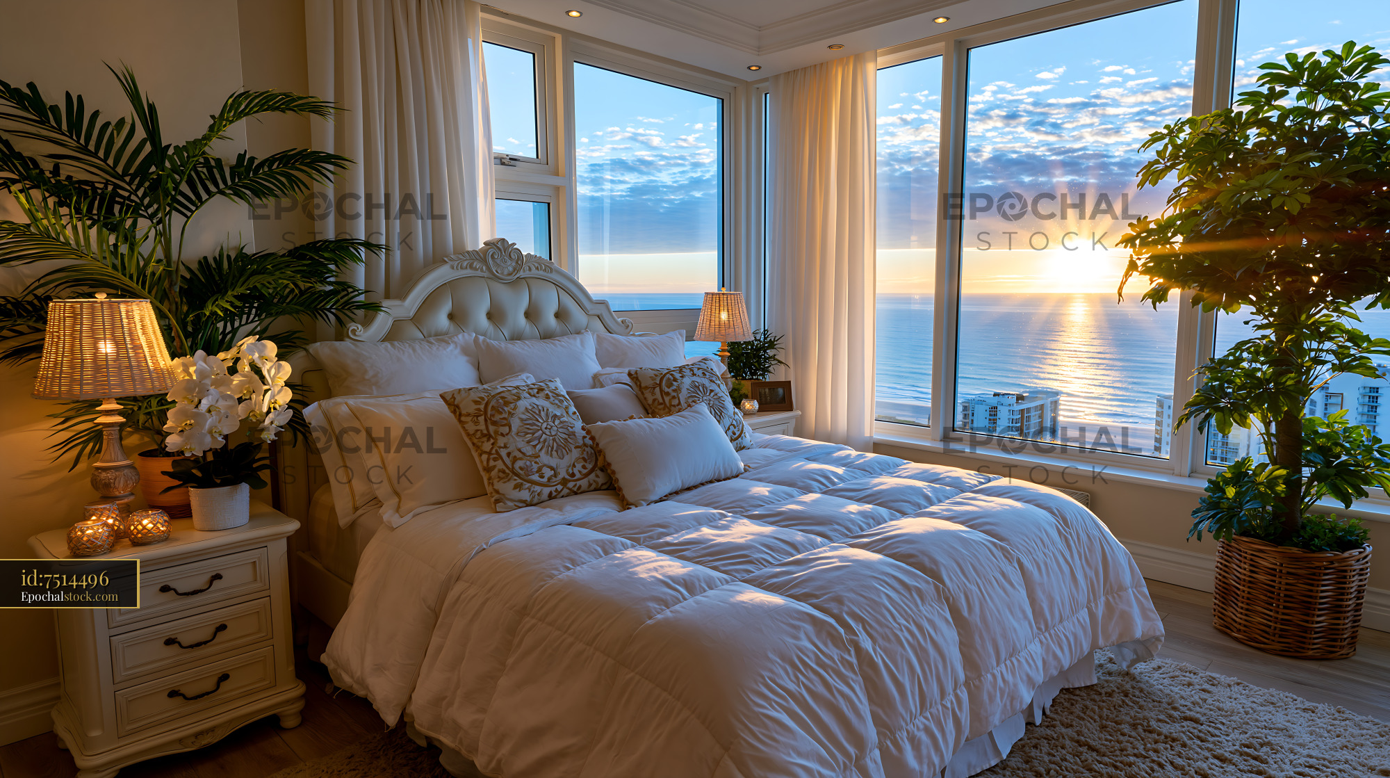 Watermarked full-resolution preview of Cozy bedroom with ocean view at sunset