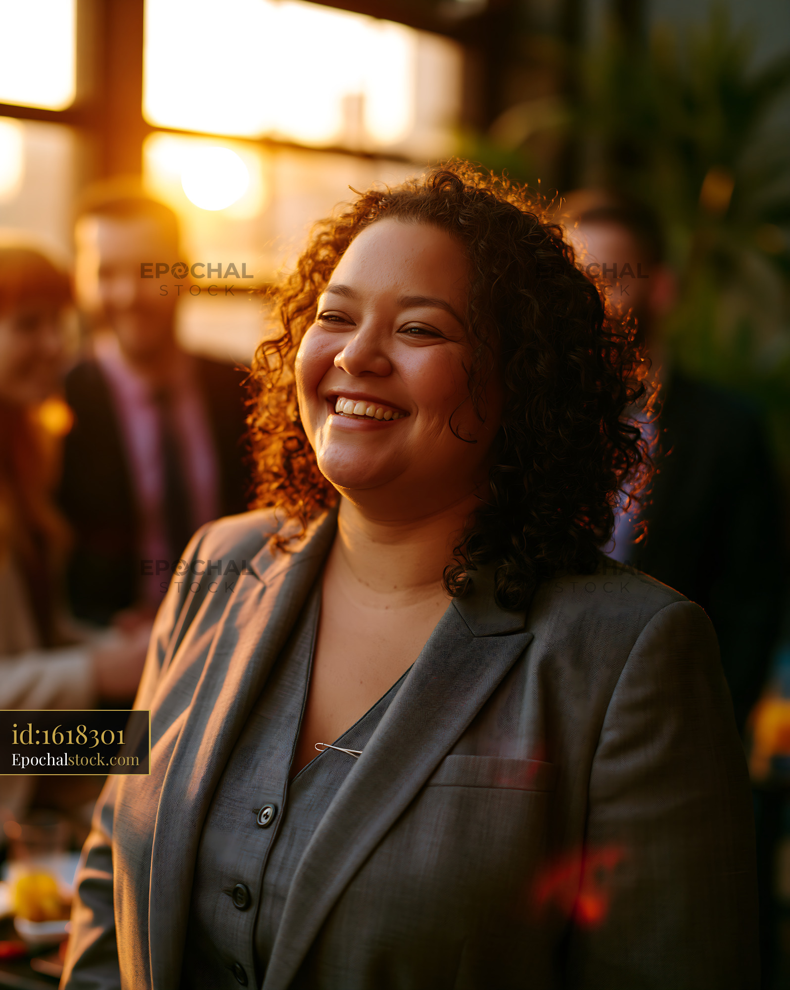 Watermarked full-resolution preview of Smiling professional woman during sunset event