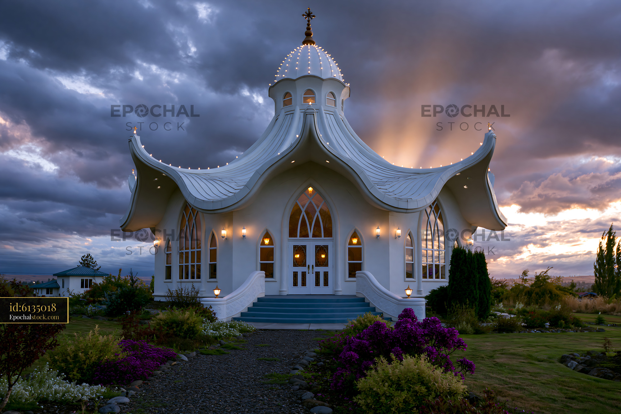 Watermarked full-resolution preview of White chapel under dark clouds with lights shining from windows