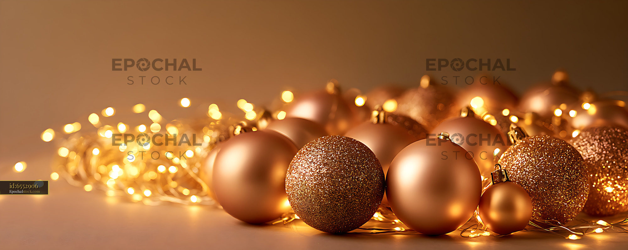 Watermarked full-resolution preview of Warm festive Christmas baubles and glowing lights