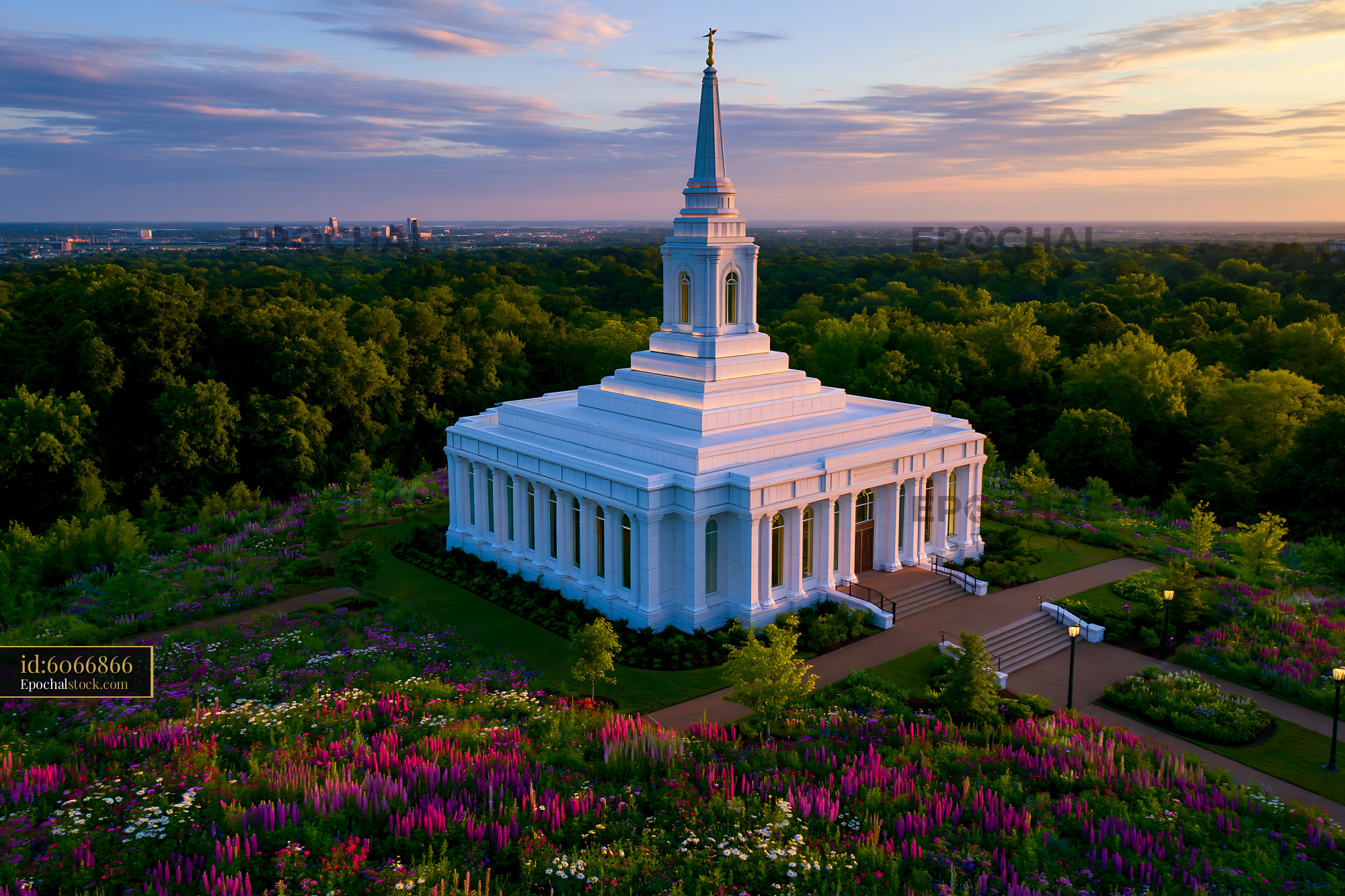 Watermarked full-resolution preview of Modern temple surrounded by gardens at sunset