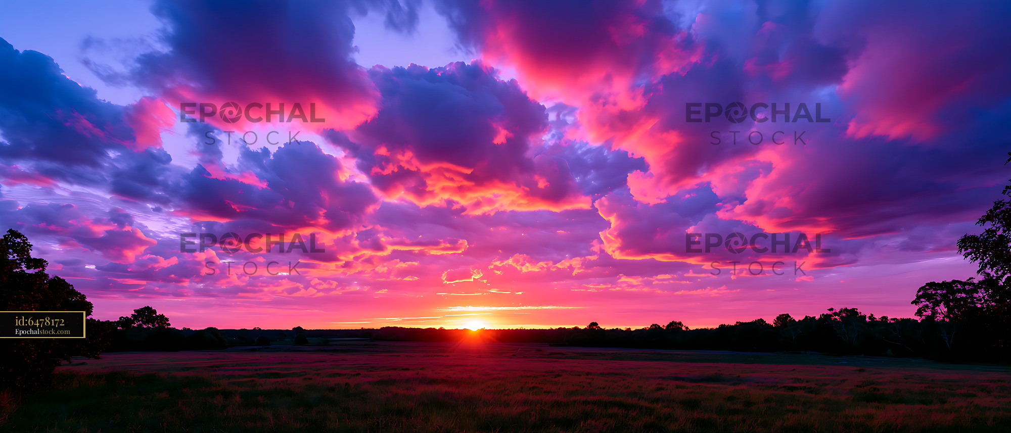 Watermarked full-resolution preview of Vivid colorful sunset and storm clouds over open farmland