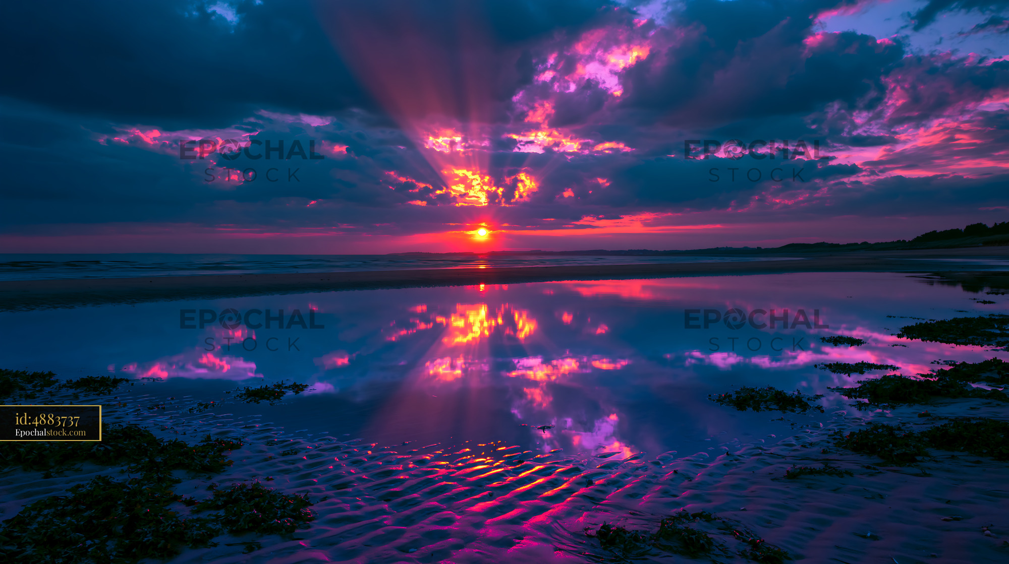 Watermarked full-resolution preview of Sunset reflections on the beach with colorful sky and clouds