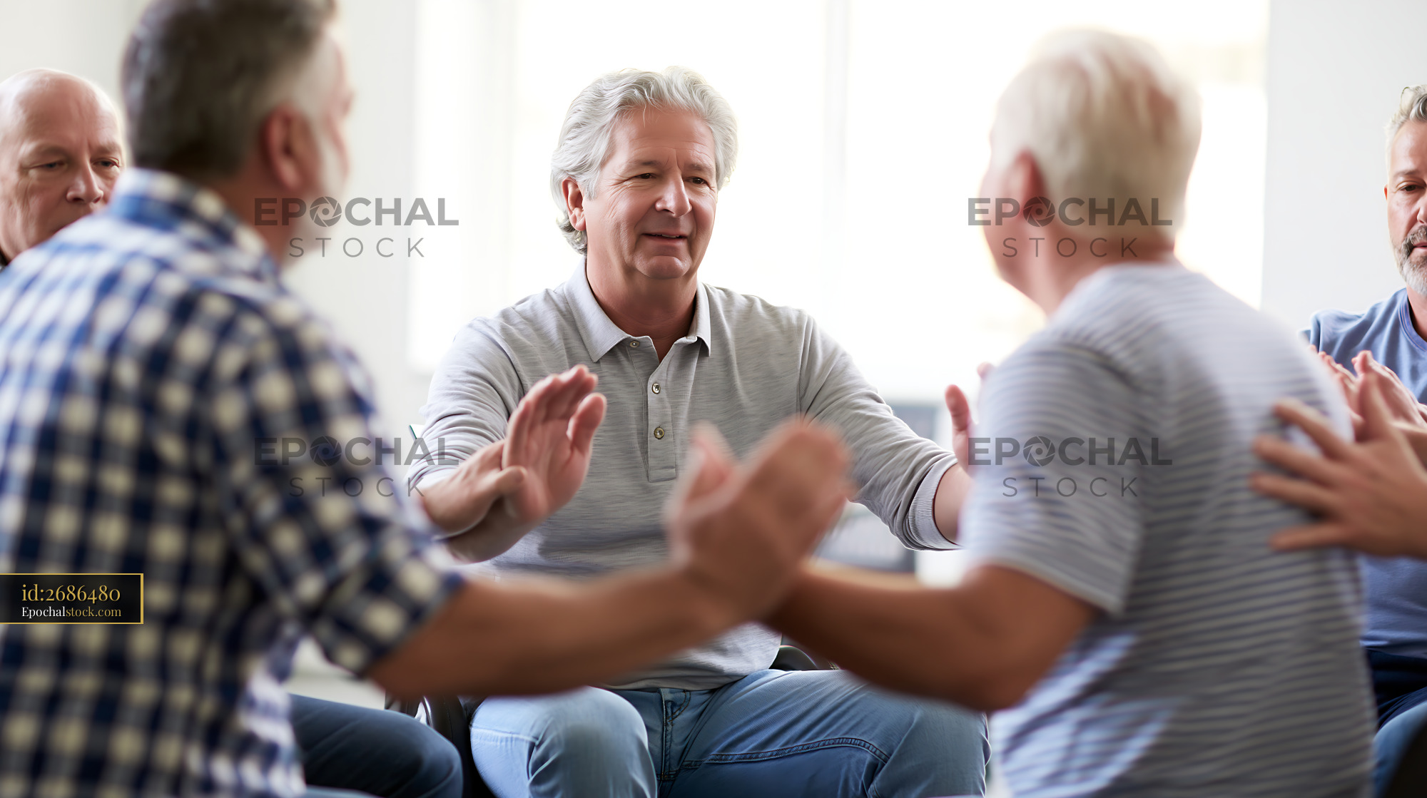 Watermarked full-resolution preview of Men participating in a group activity in a bright room