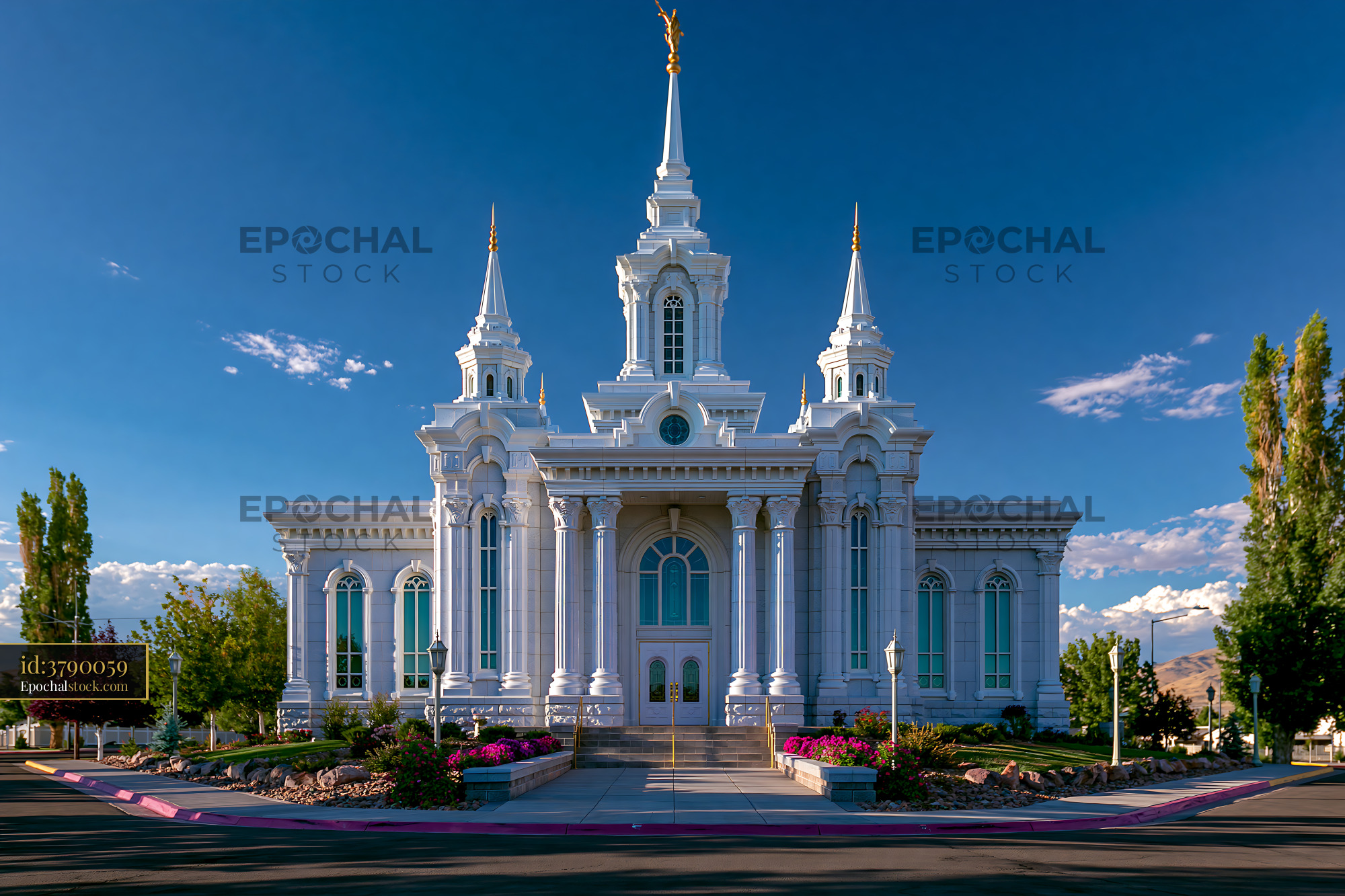 Watermarked full-resolution preview of Beautiful church with tall spires under a clear blue sky