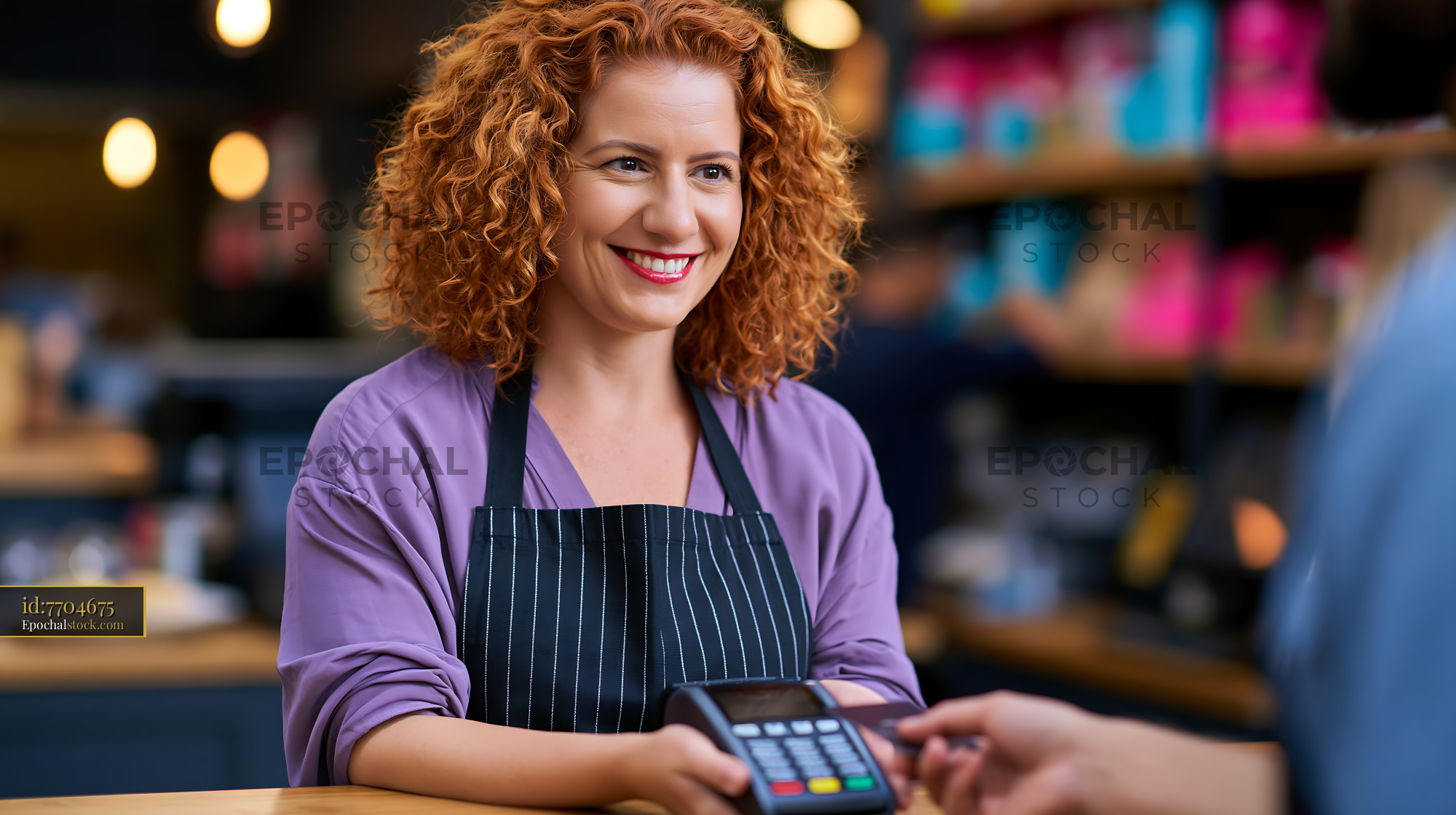 Watermarked full-resolution preview of Cashier assists customer with payment at a cafe