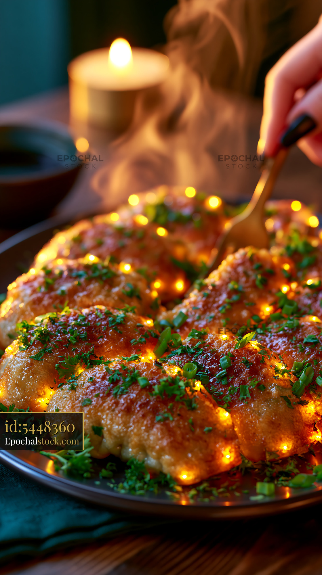 Watermarked full-resolution preview of Delicious food served on a warm plate with herbs and glow