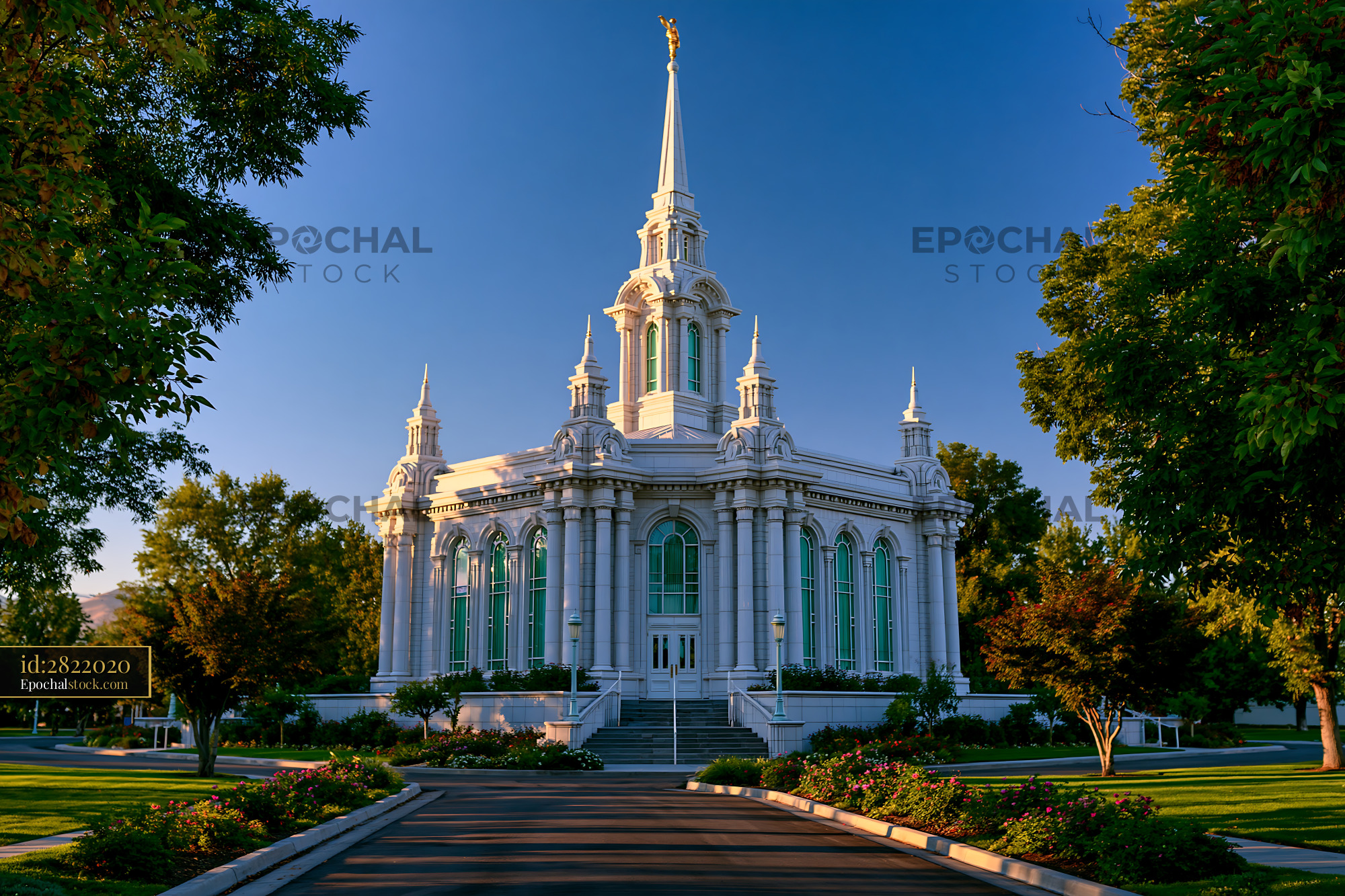 Watermarked full-resolution preview of Beautiful temple surrounded by greenery in bright sunlight