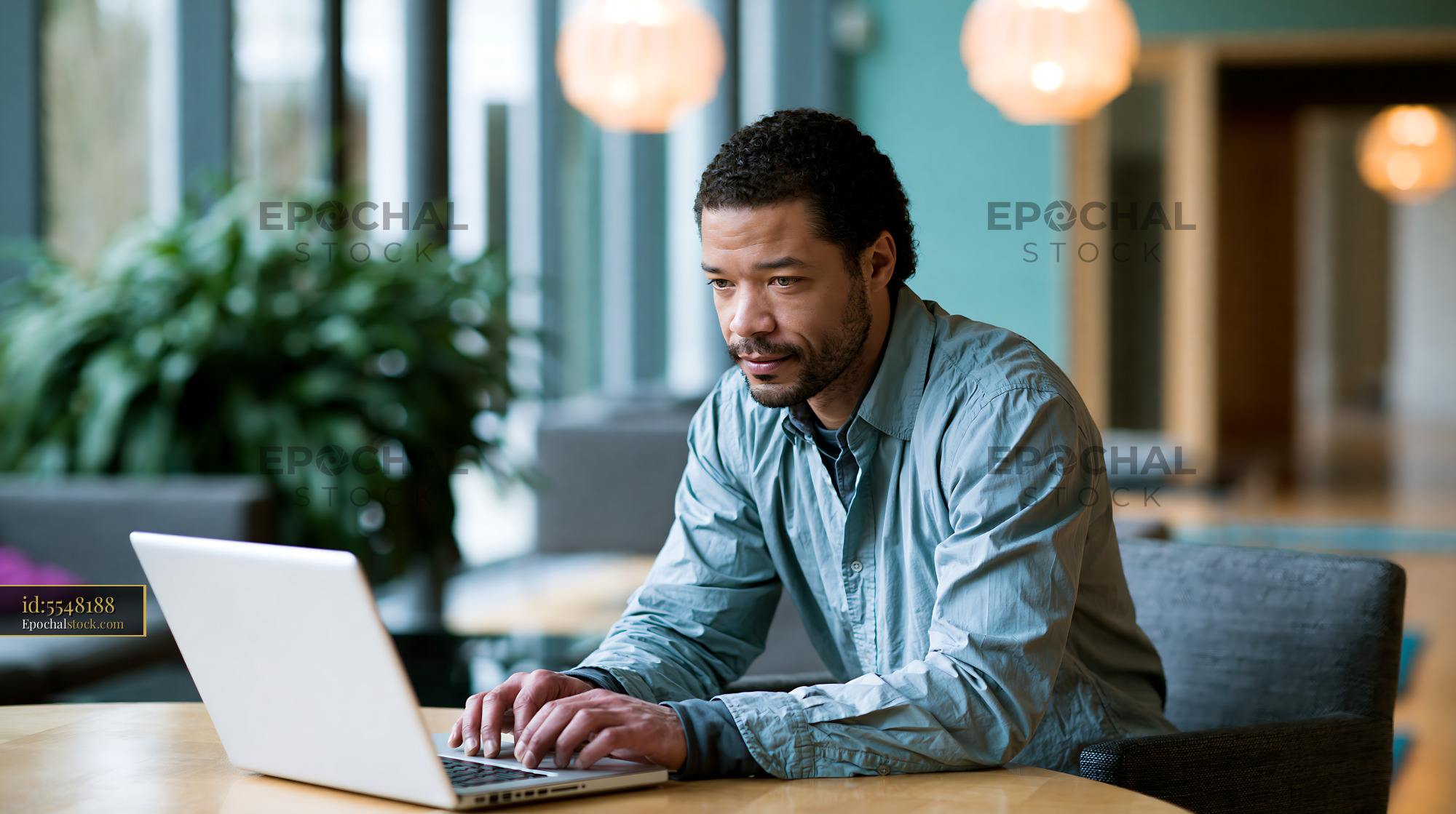 Citizen Using E-Government Portal at Home in a Modern Setting - stock photo