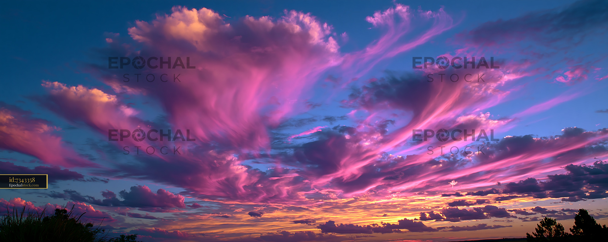 Watermarked full-resolution preview of Vibrant clouds at sunset over a rural landscape