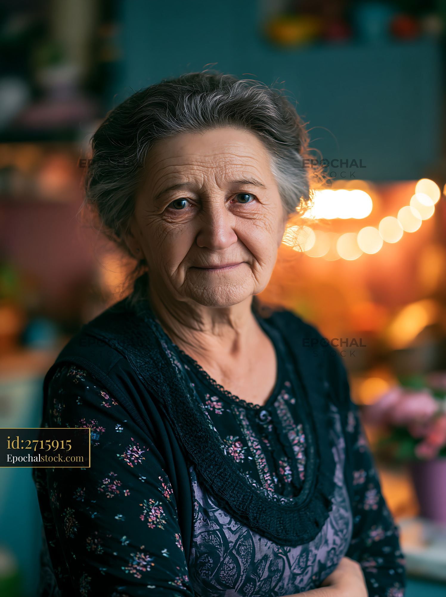 Watermarked full-resolution preview of Elderly woman with gray hair standing in a cozy interior